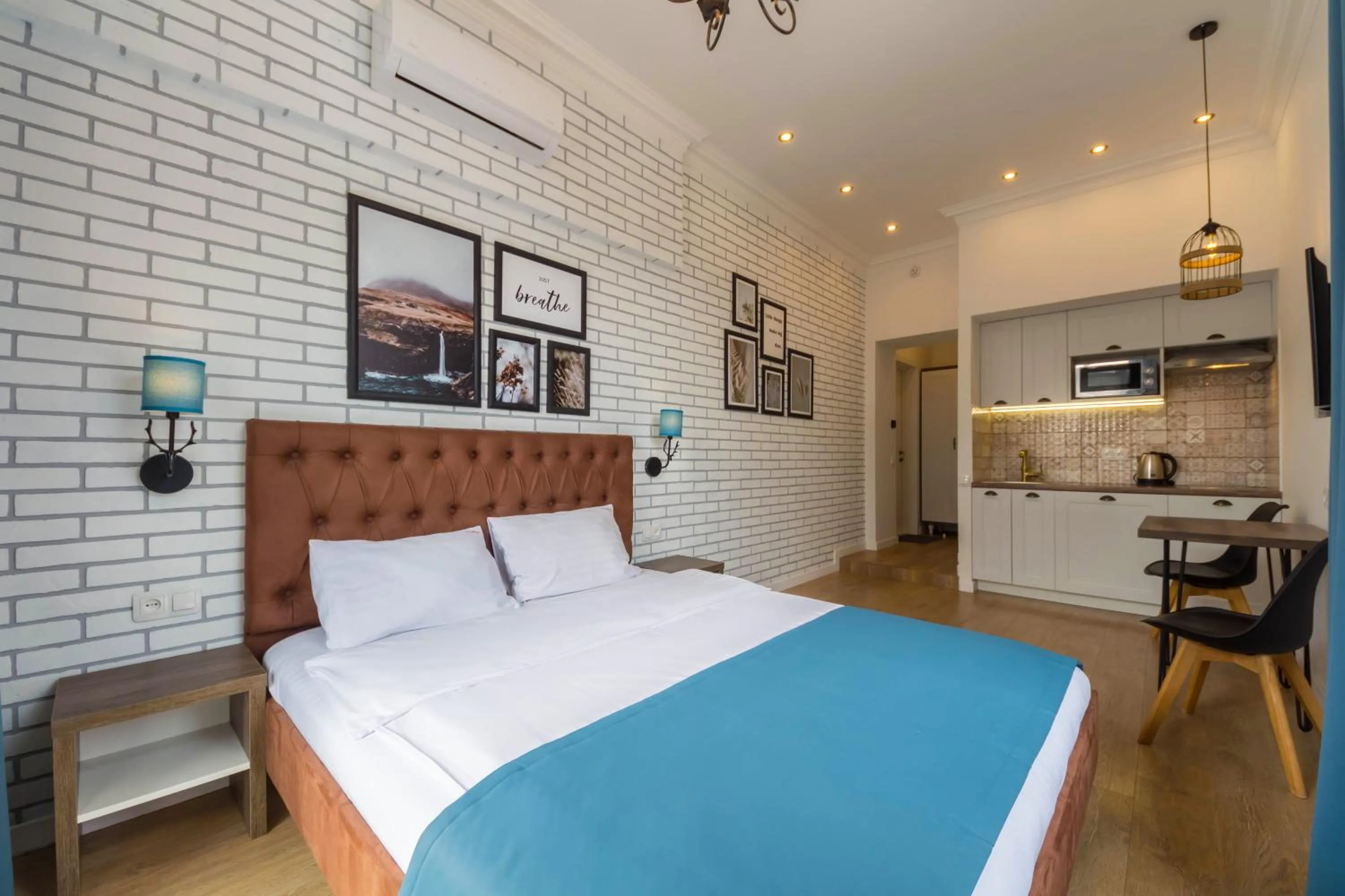 Bed in Scandinavian Apartments