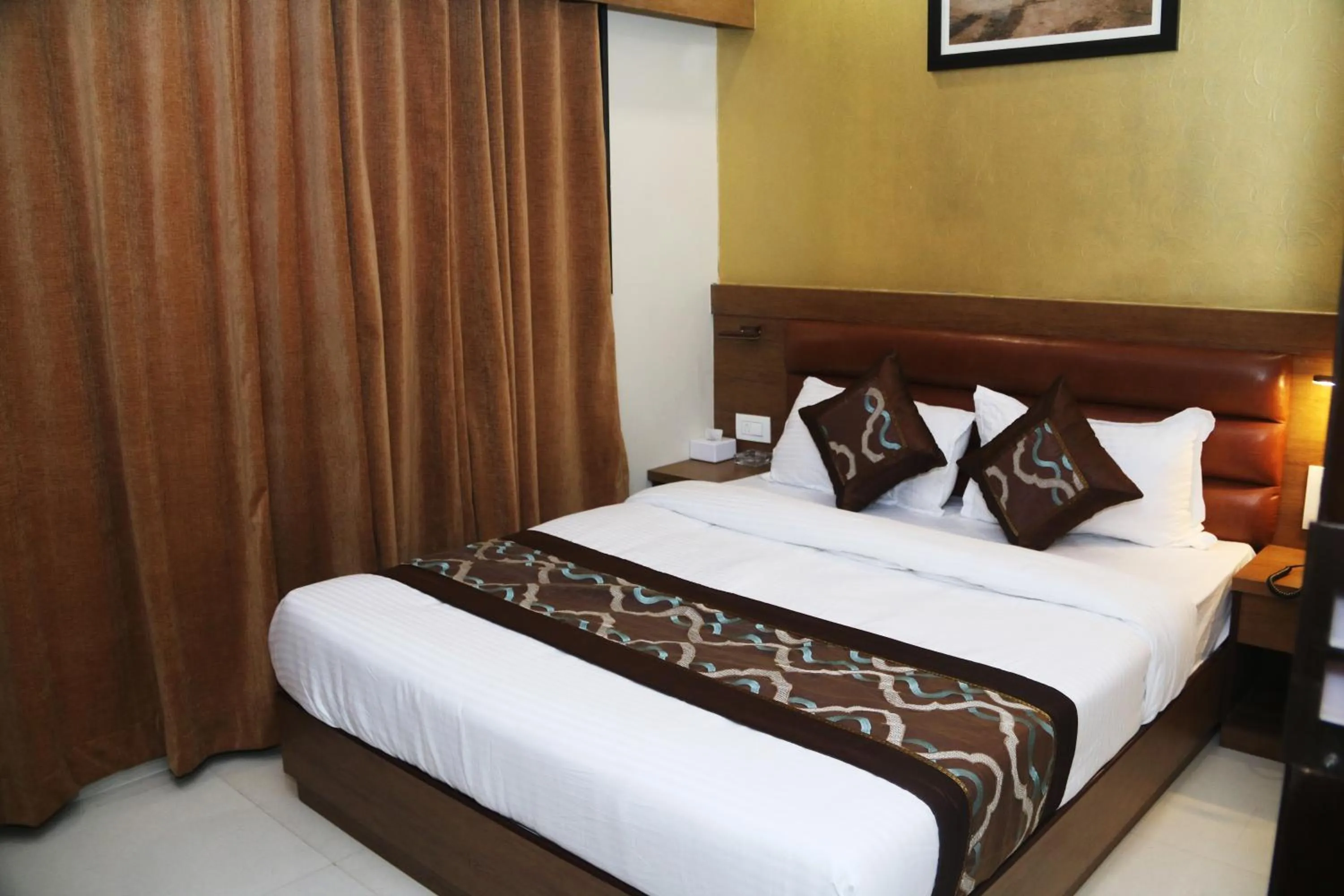 Bed in Hotel Crystal Luxury Inn- Bandra