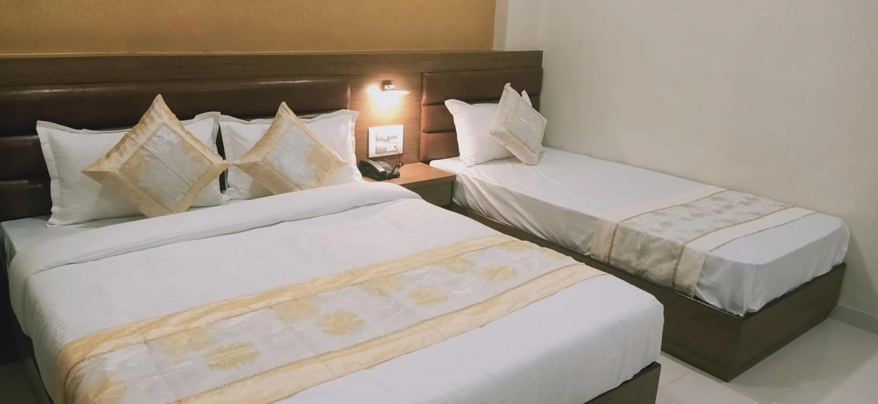 Bed in Hotel Crystal Luxury Inn- Bandra