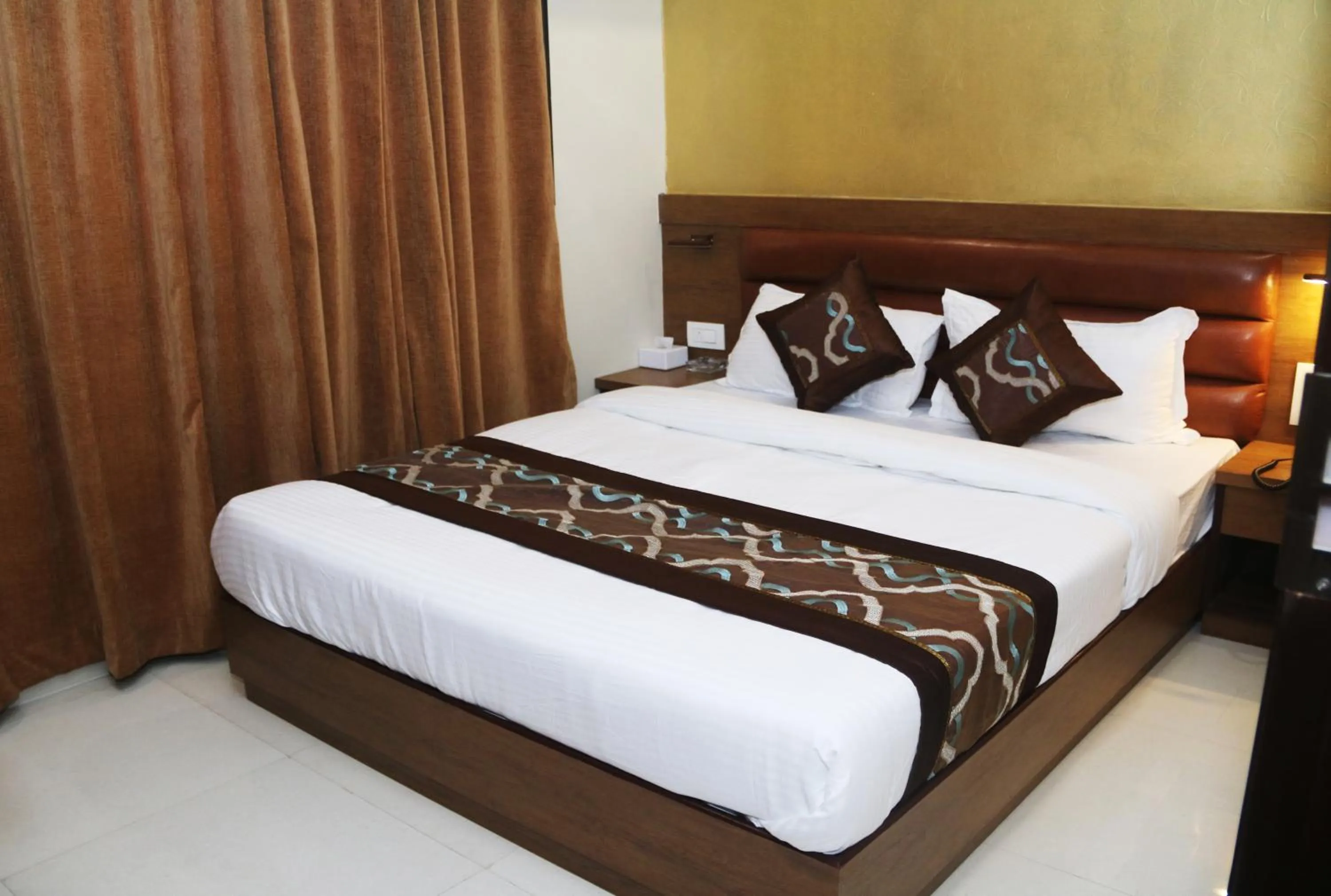 Bed in Hotel Crystal Luxury Inn- Bandra