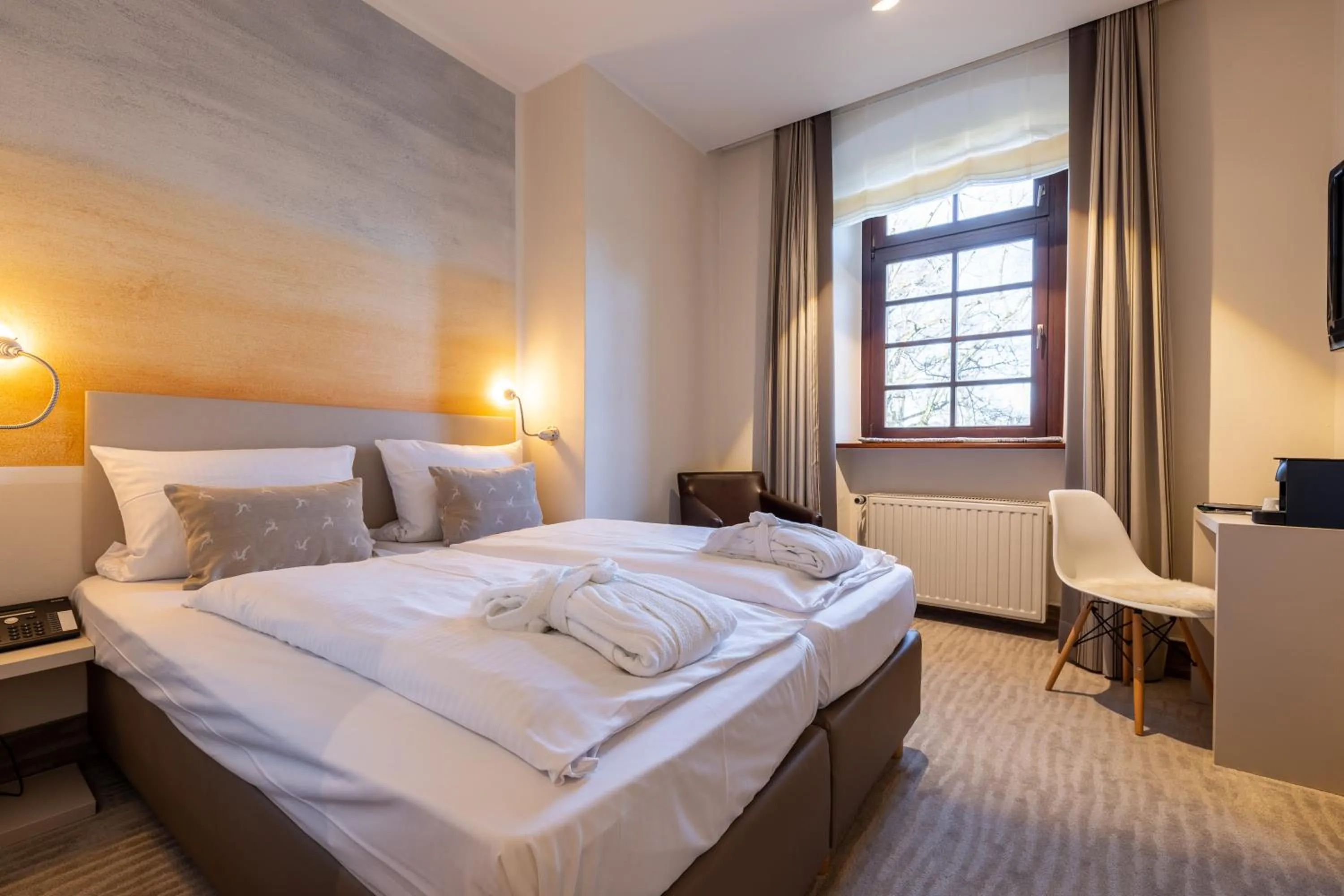 Photo of the whole room, Bed in Jagdschloss Hotel Niederwald