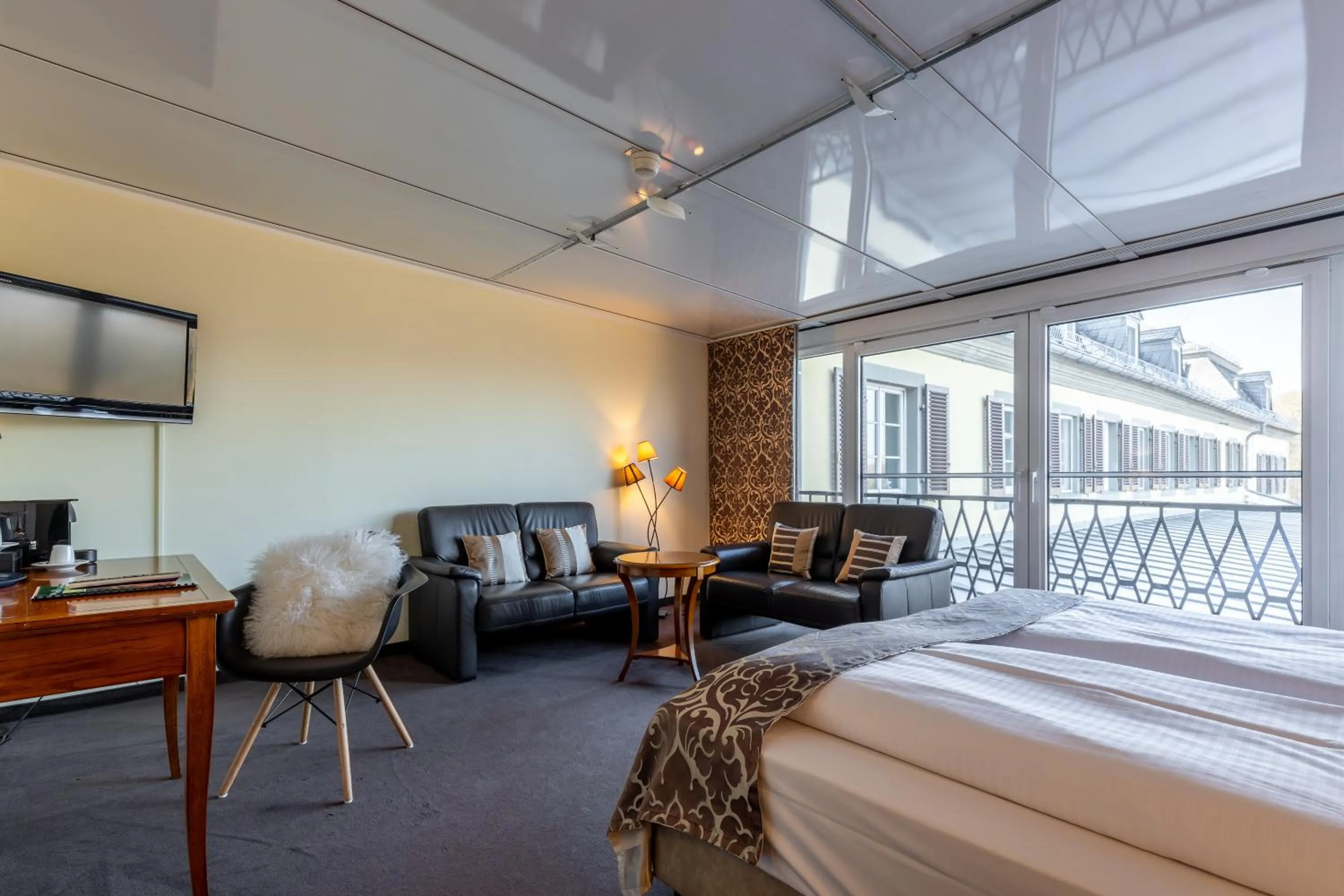 Photo of the whole room, Bed in Jagdschloss Hotel Niederwald