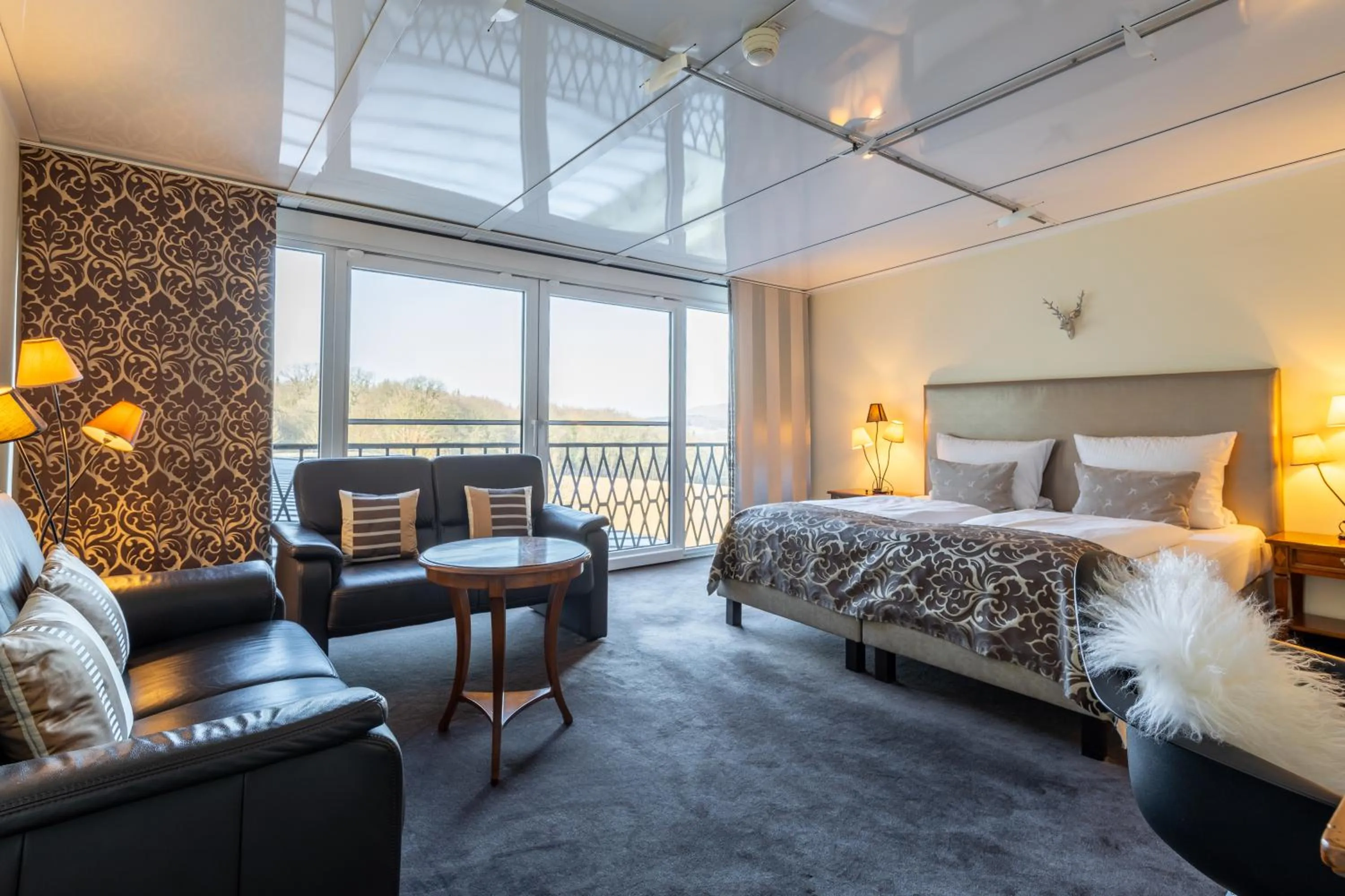 Photo of the whole room, Bed in Jagdschloss Hotel Niederwald