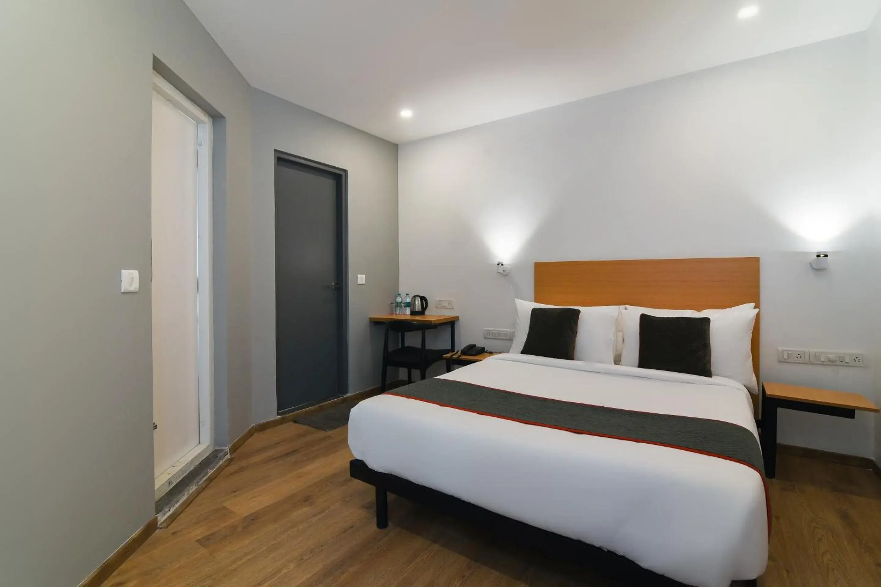 Bedroom, Bed in Super Townhouse Spruce Hotels Bellandur Bedroom, Bed in Super Townhouse Spruce Hotels Bellandur