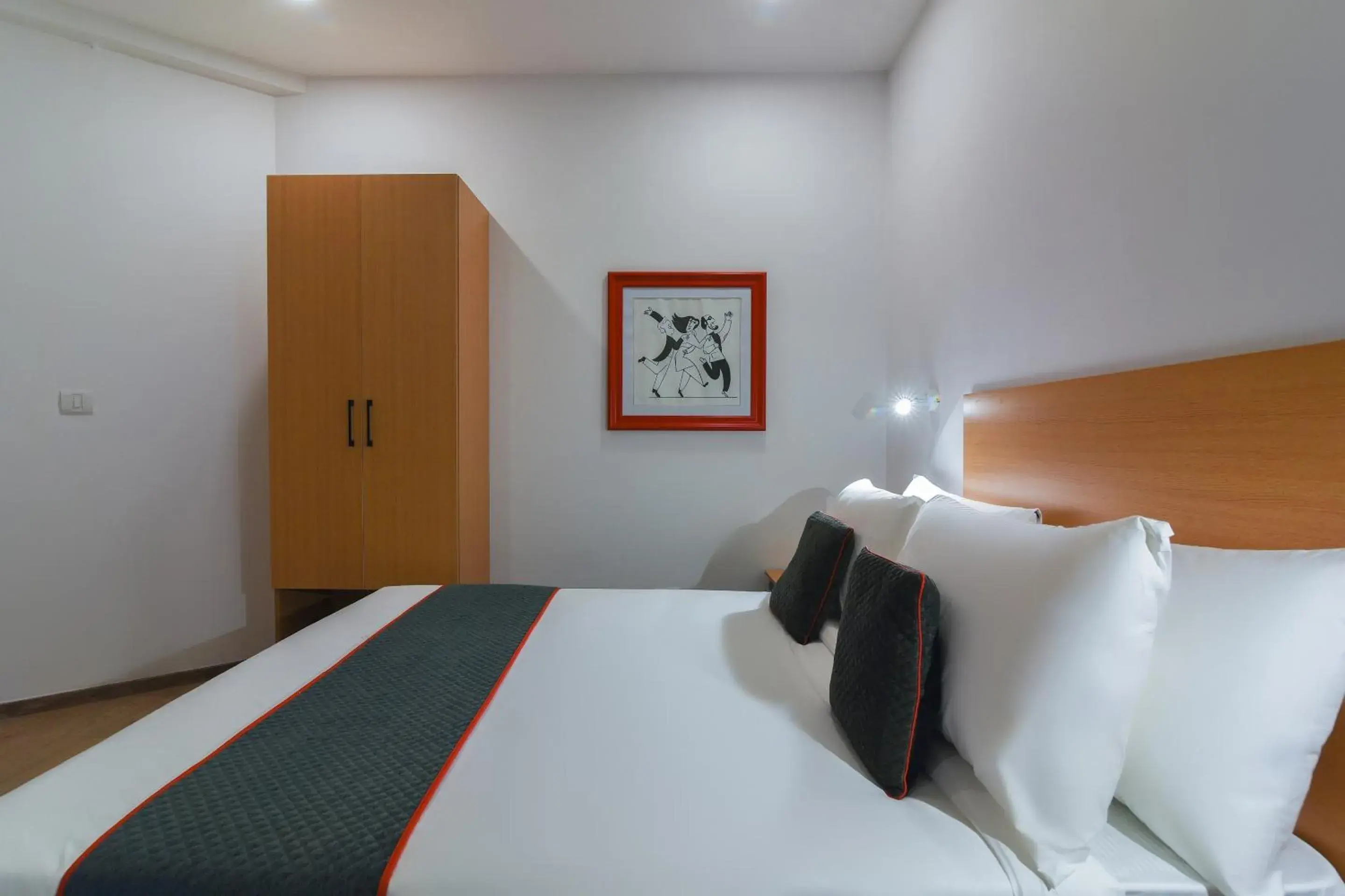 Bedroom, Bed in Super Townhouse Spruce Hotels Bellandur Bedroom, Bed in Super Townhouse Spruce Hotels Bellandur