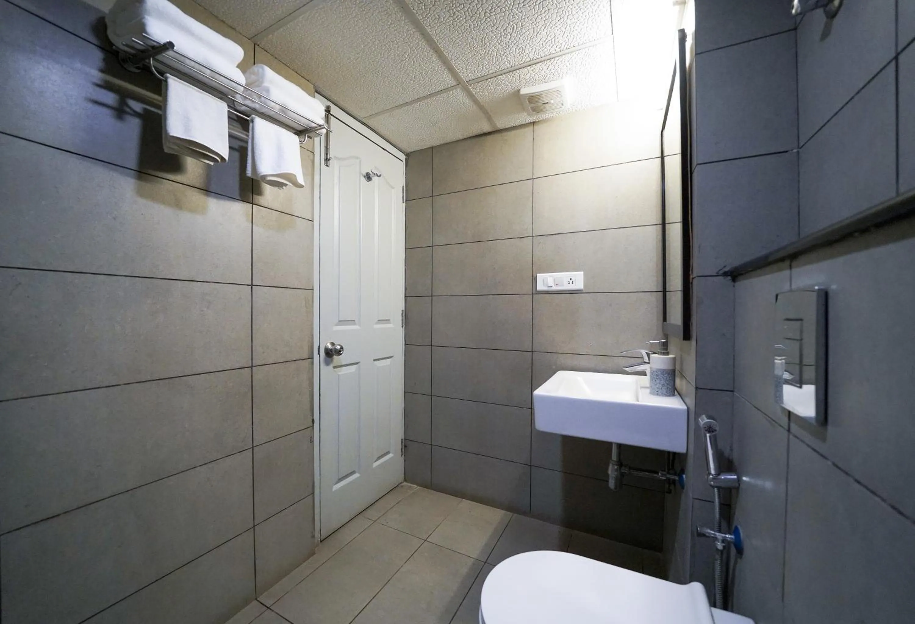 Bathroom in Olive Zip Kalyan Nagar by Embassy Group