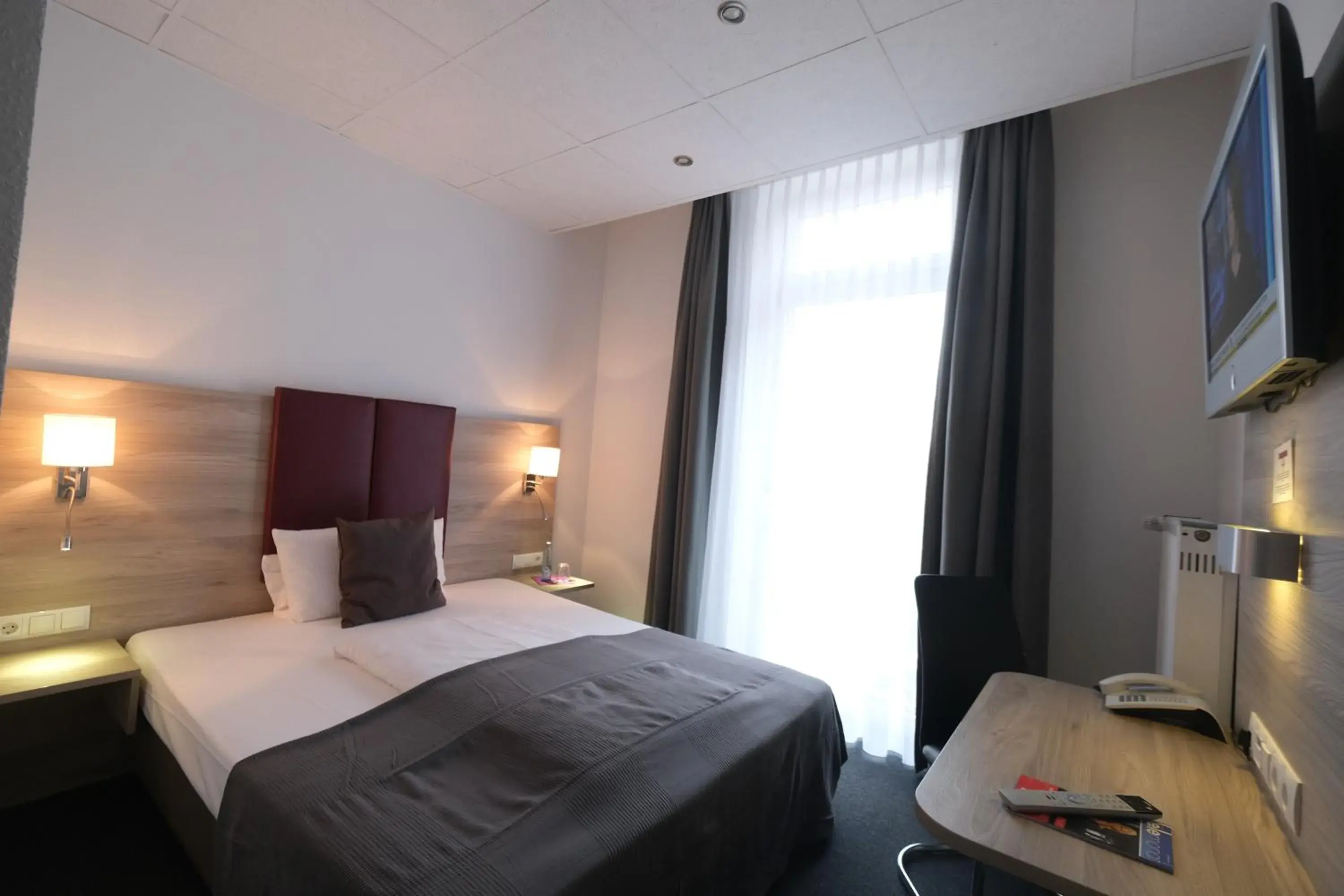 Bed in Hotel Hohenstaufen Bed in Hotel Hohenstaufen