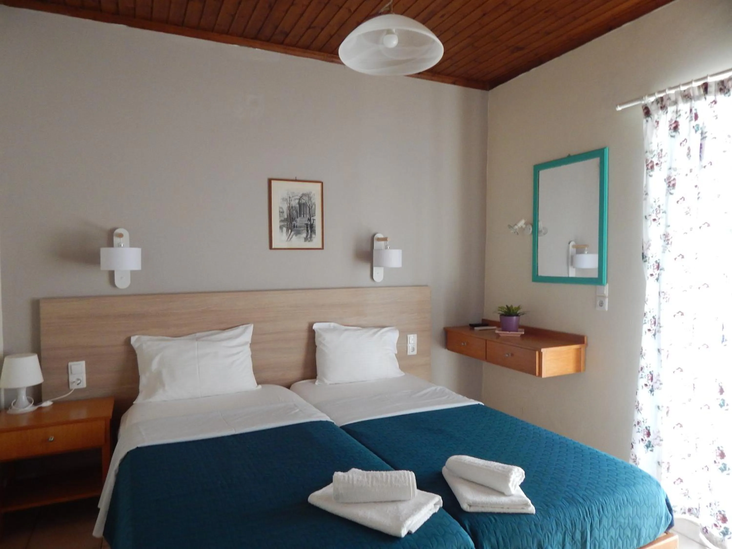 Bed in Posidonio Hotel