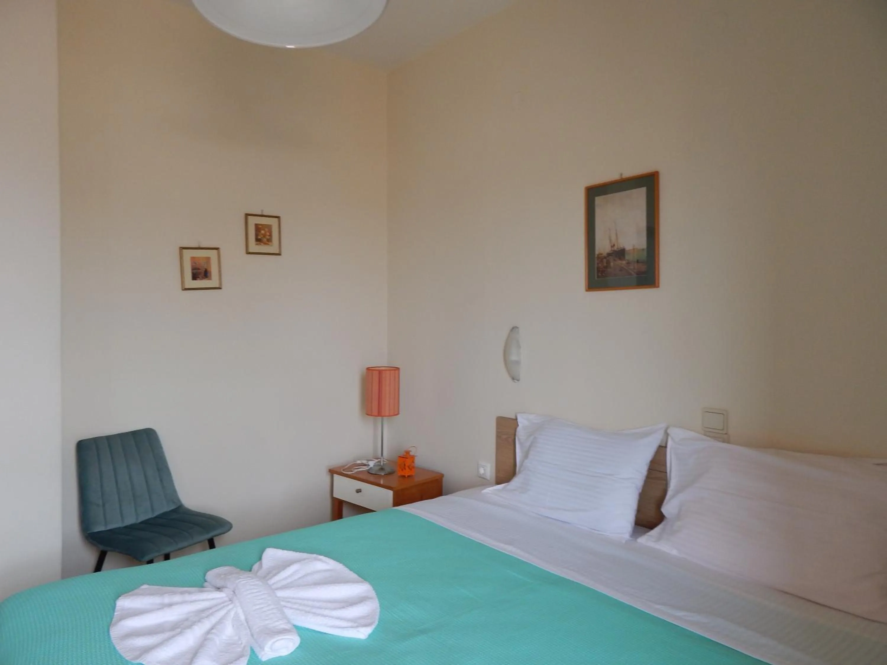 Bed in Posidonio Hotel