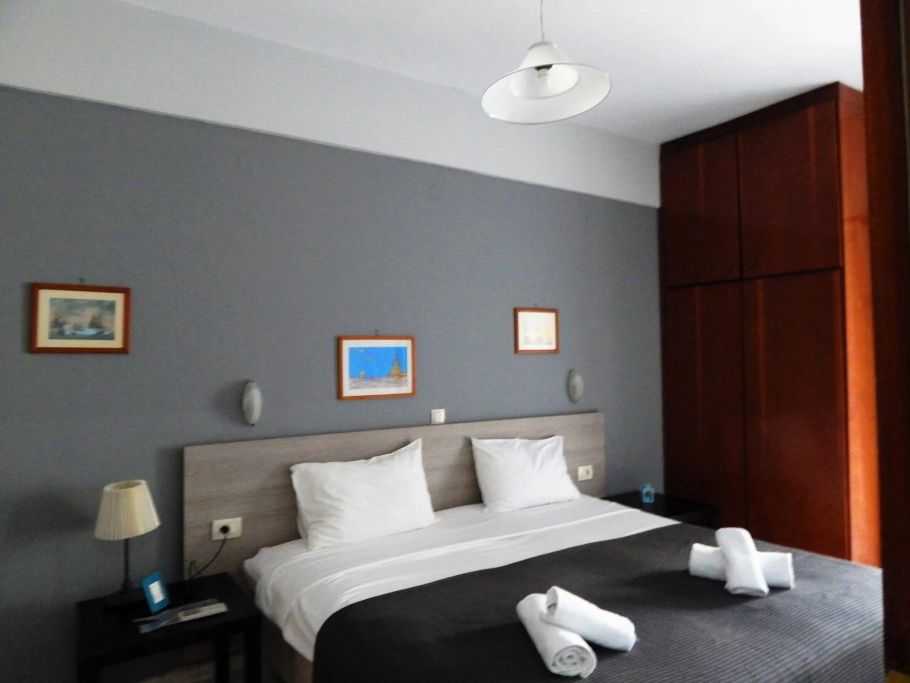 Bed in Posidonio Hotel