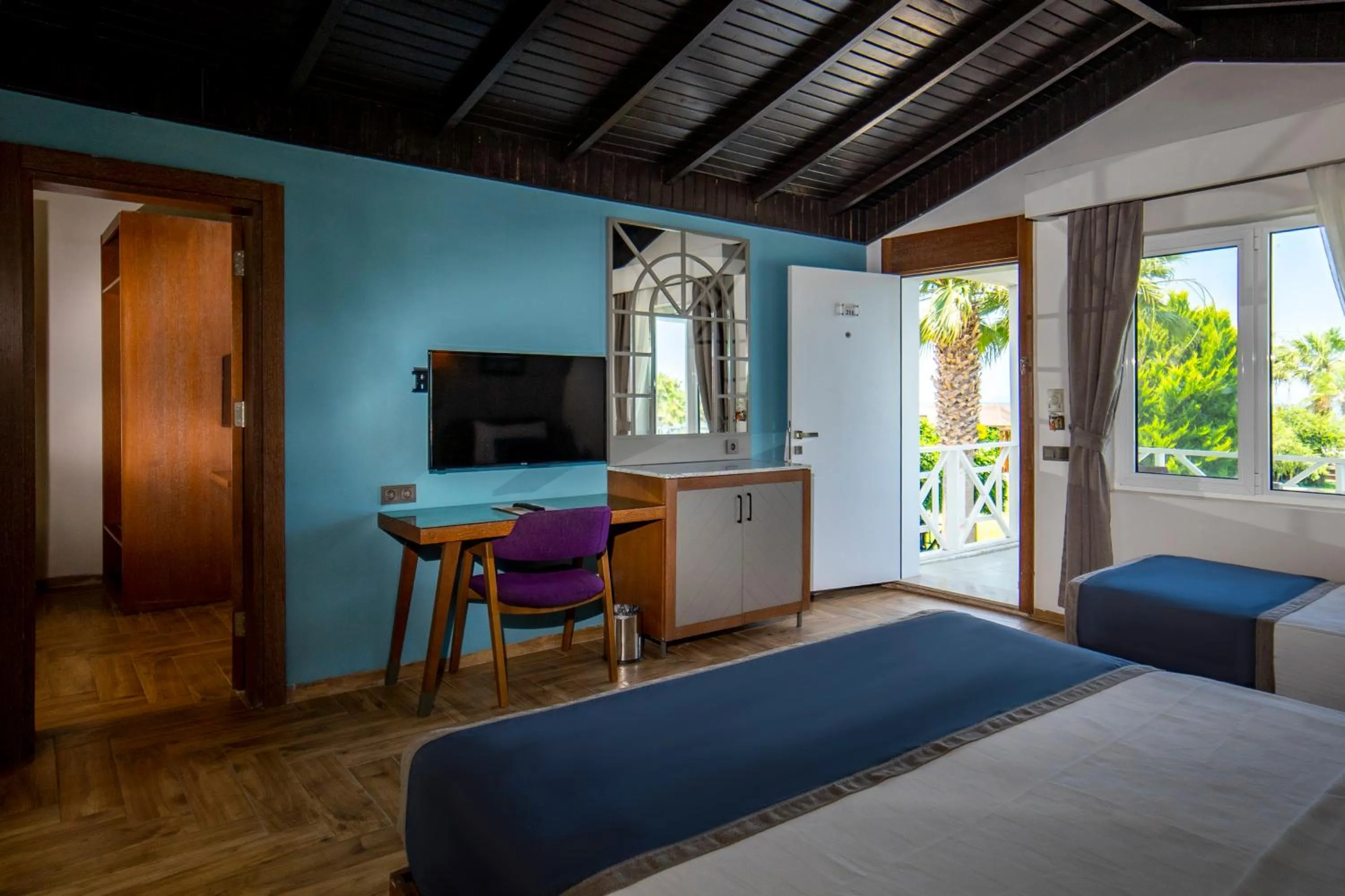 Bed in Risus Beach Resort Hotel