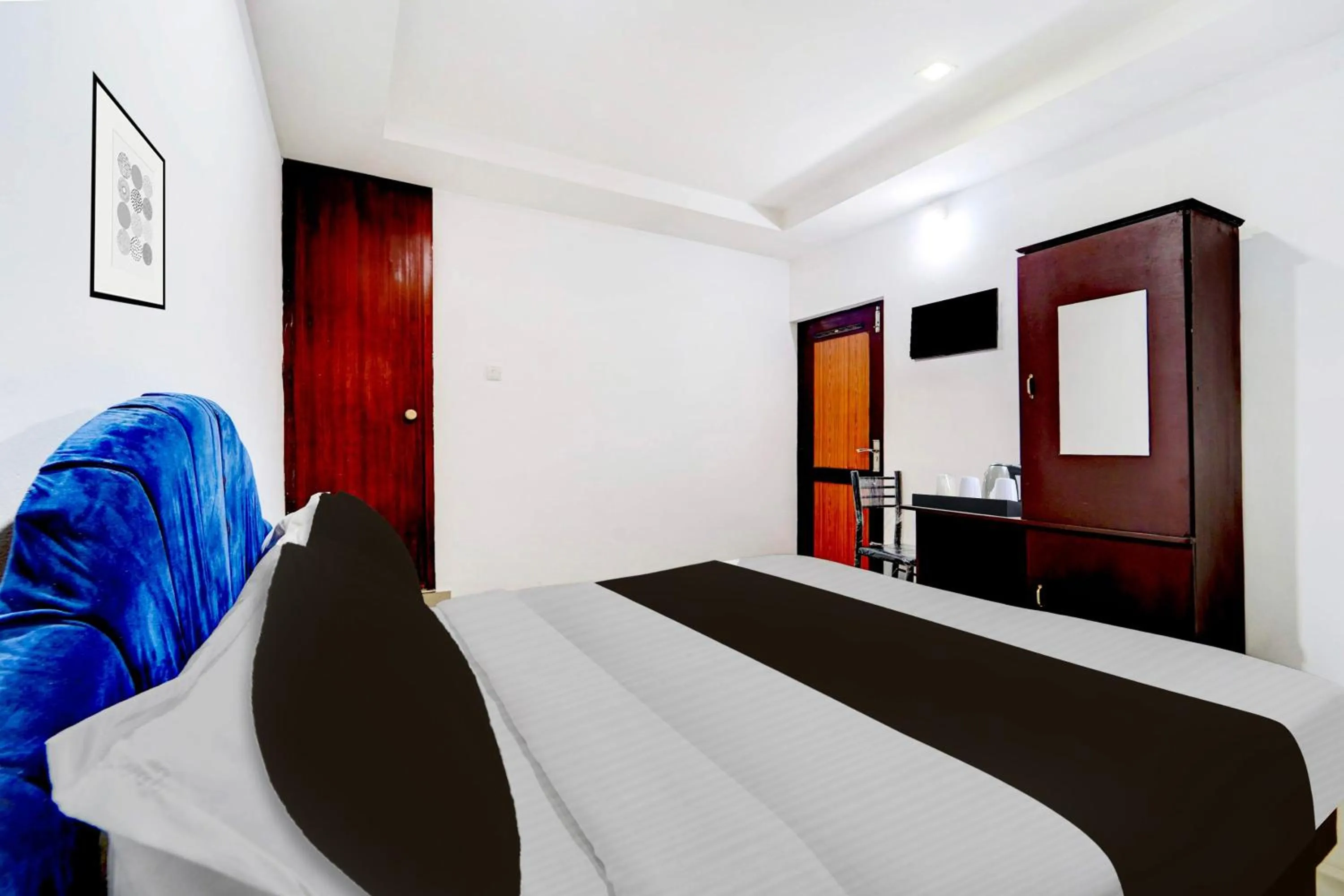 Bedroom, Bed in Super Hotel O Kunnamangalam Near Bus Stand