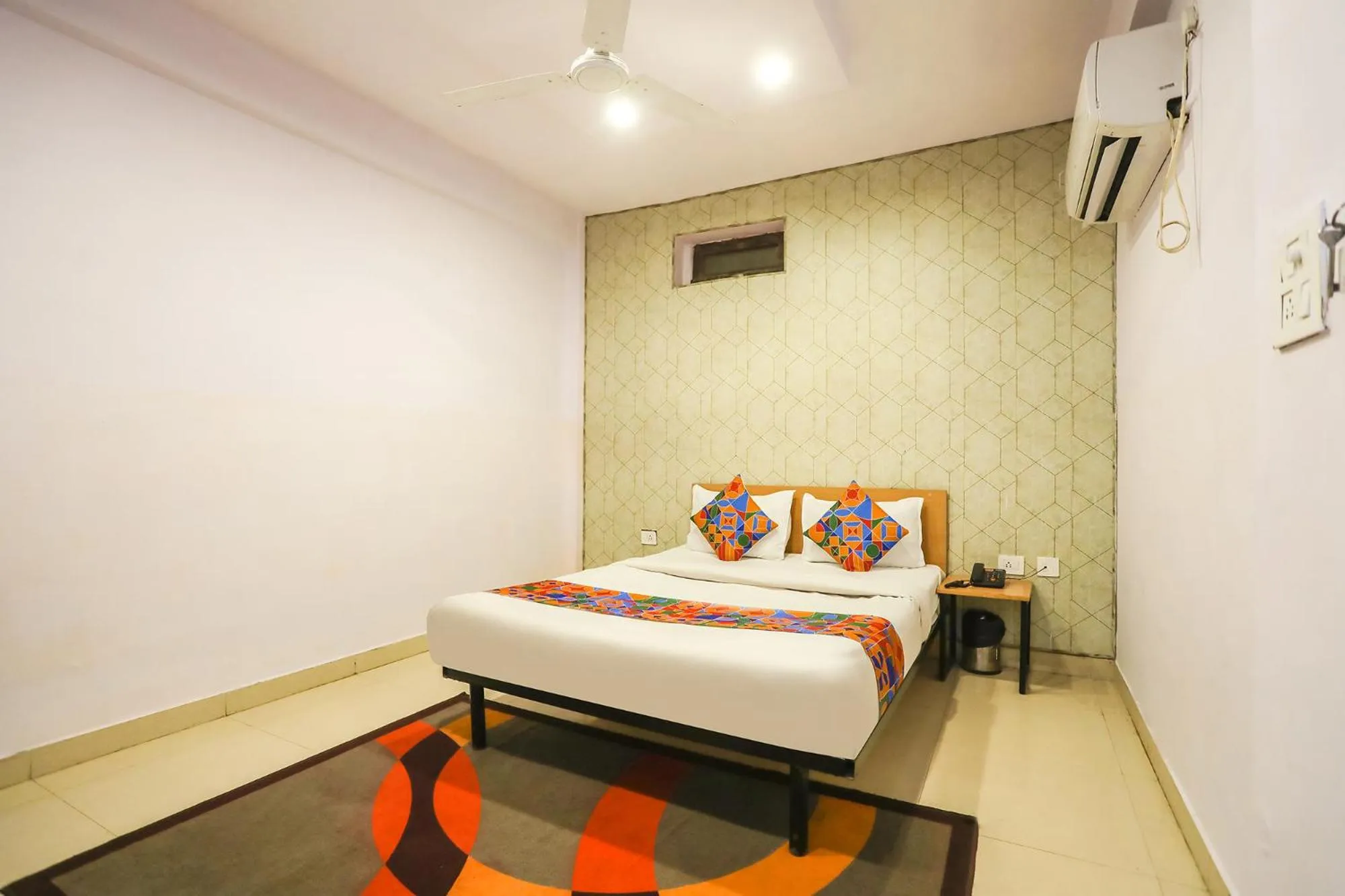 Bed in FabHotel Pranjul Inn