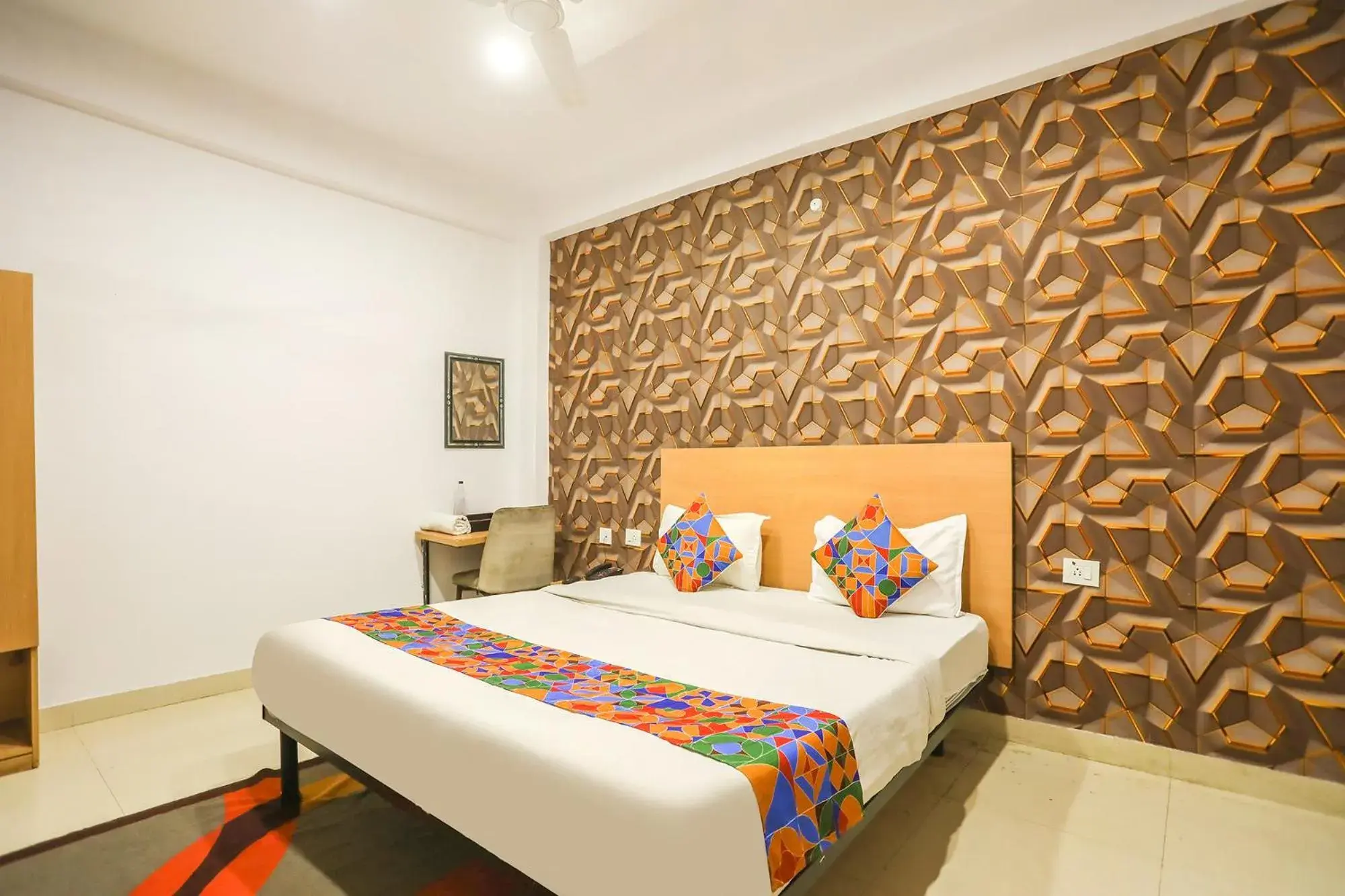 Bed in FabHotel Pranjul Inn Bed in FabHotel Pranjul Inn