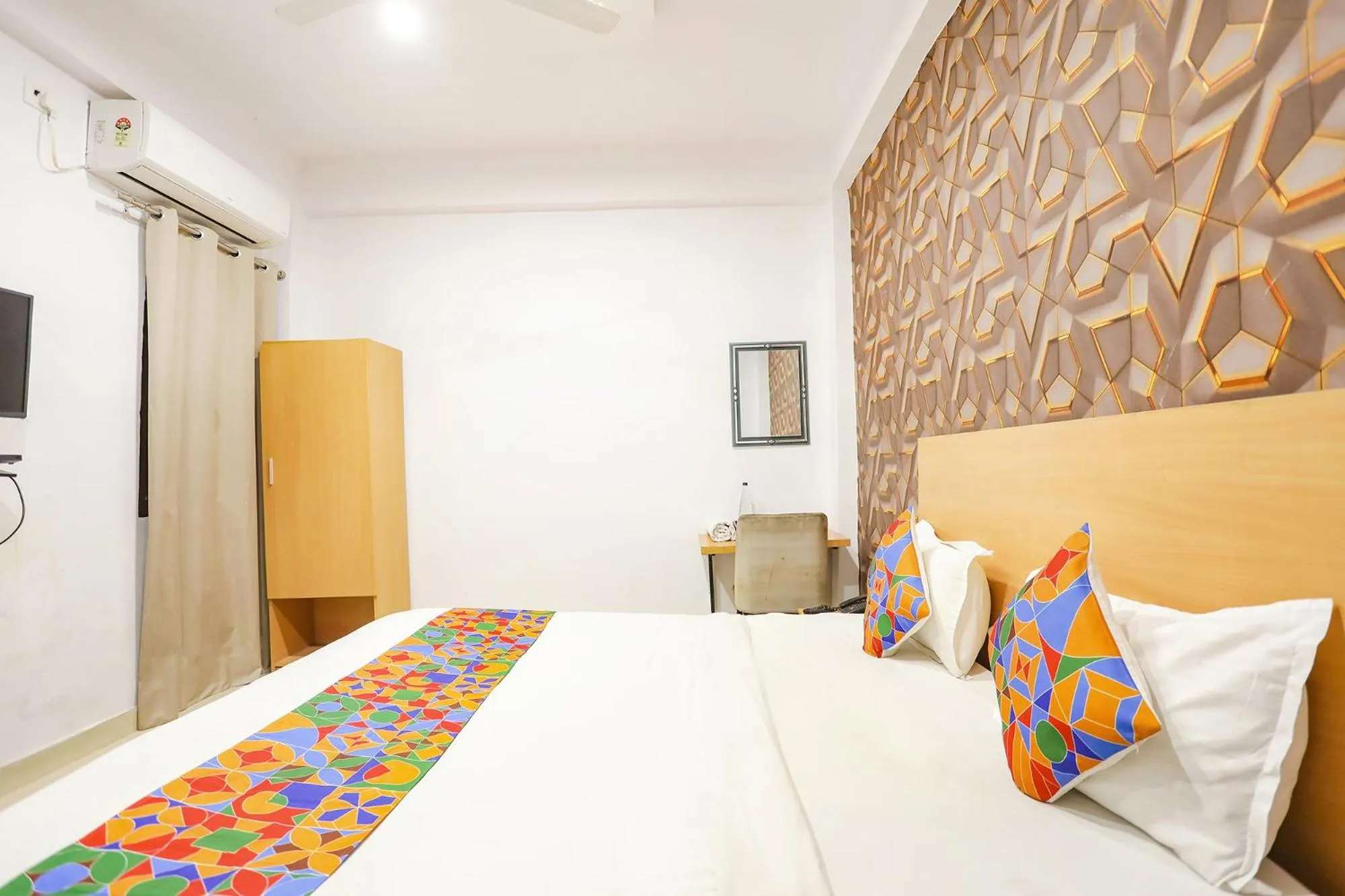 Bed in FabHotel Pranjul Inn