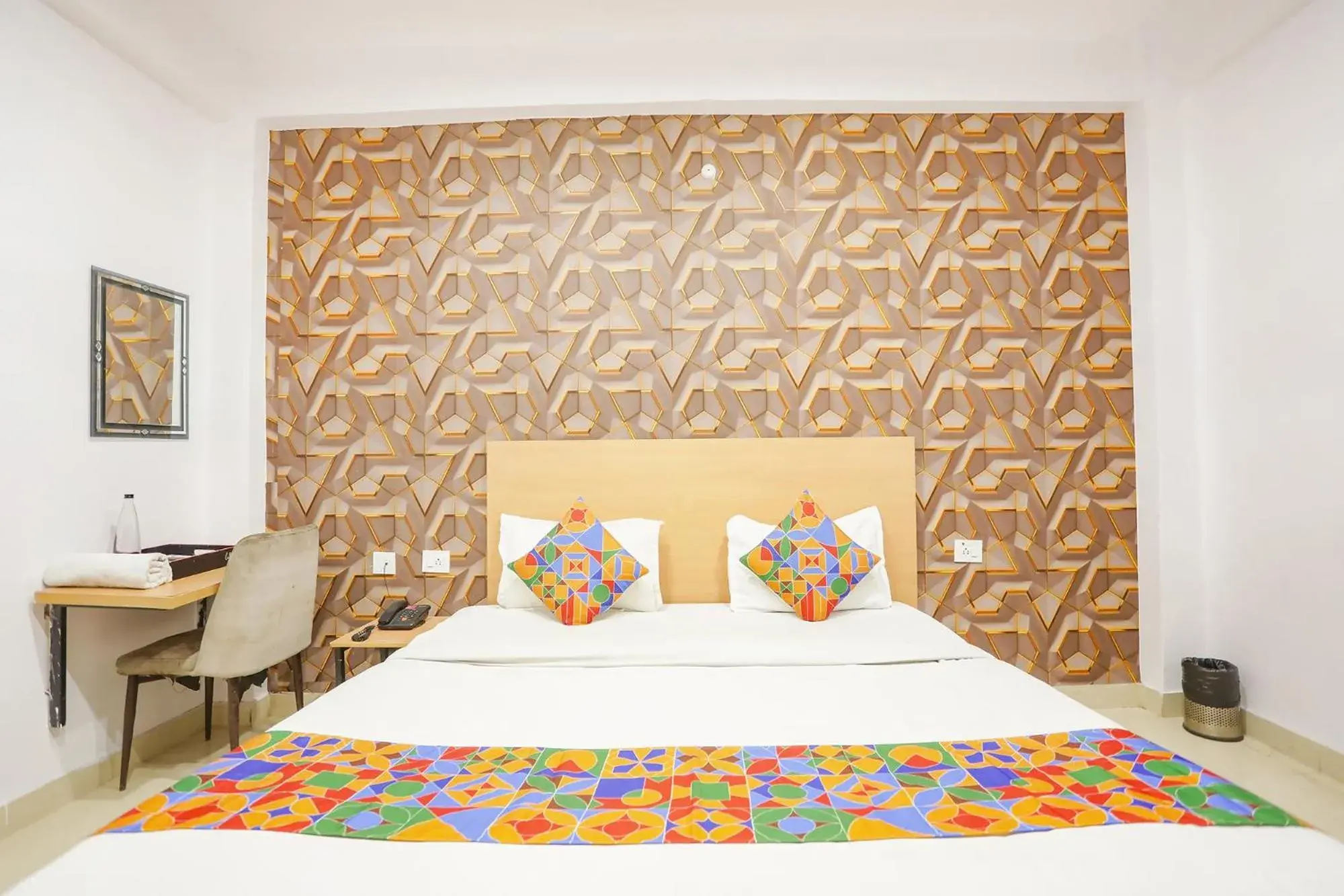 Bed in FabHotel Pranjul Inn Bed in FabHotel Pranjul Inn