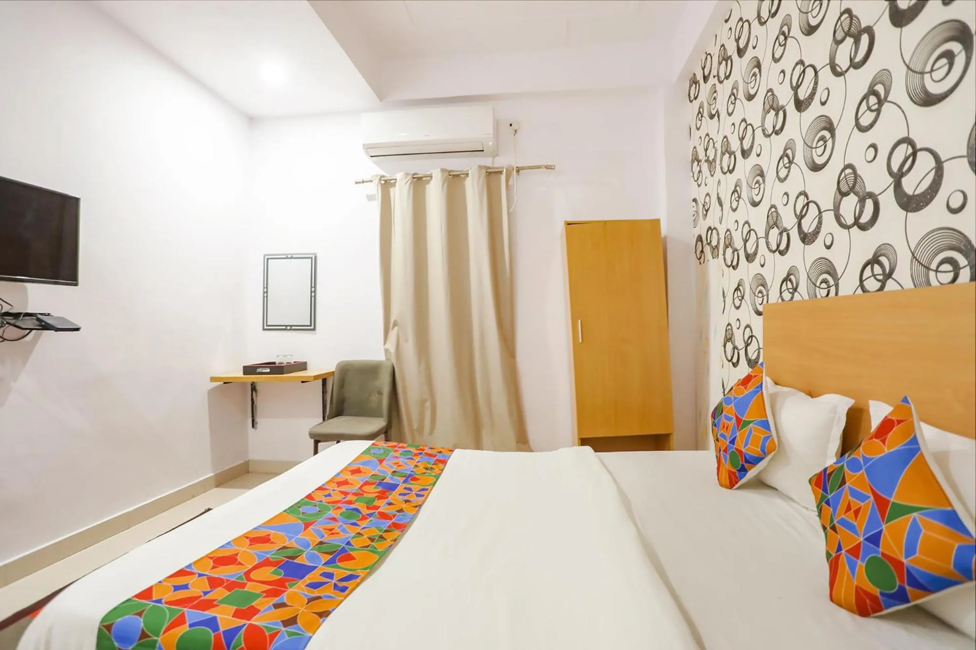 Bed in FabHotel Pranjul Inn