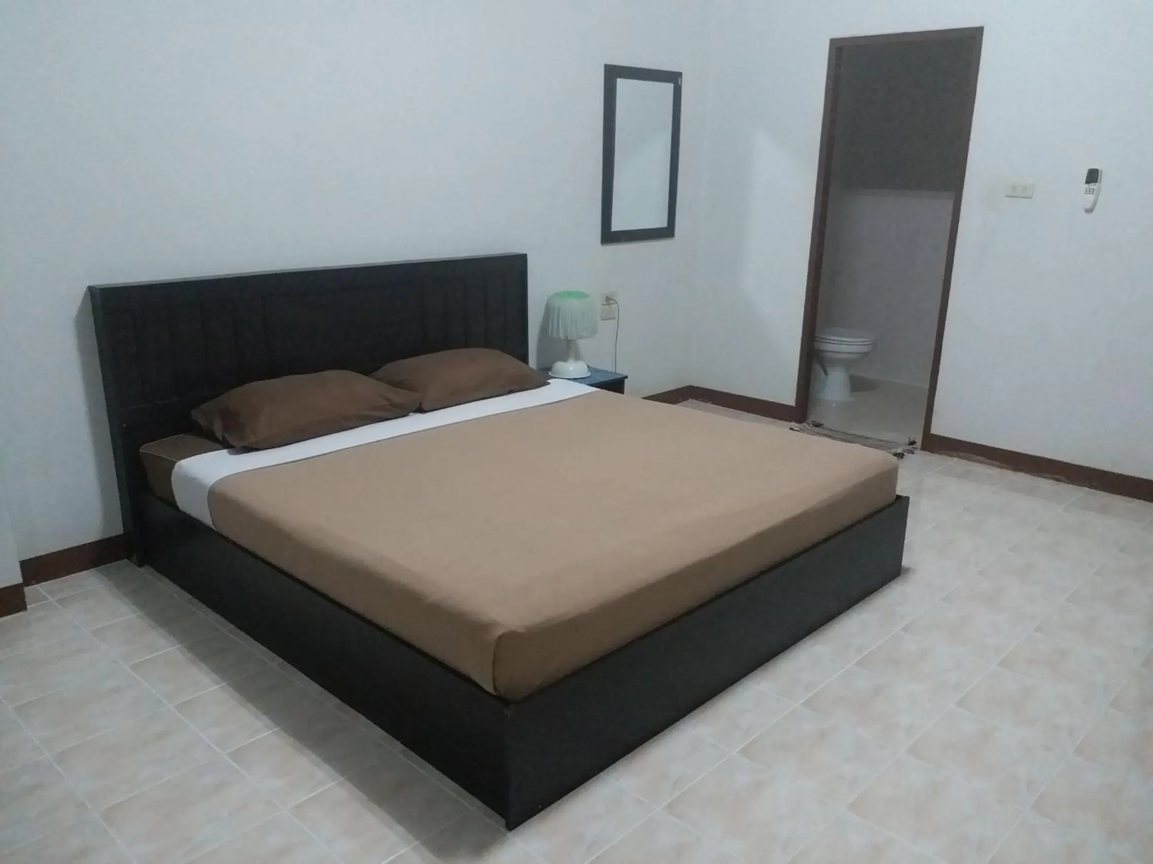 Bed in Maman Mansion