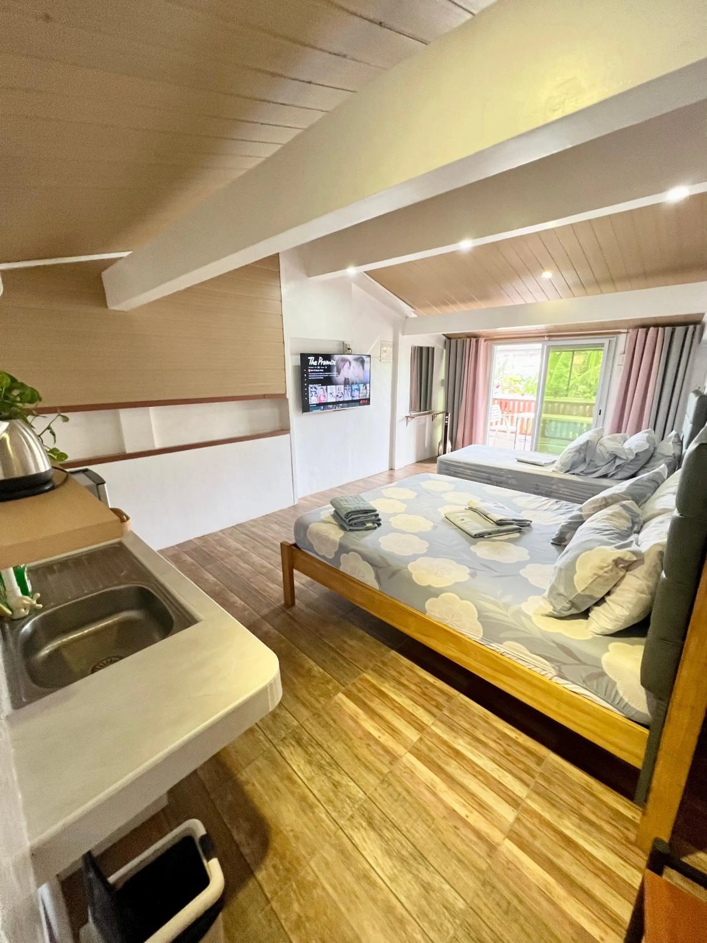 Bed in Balai Tinay Guesthouse