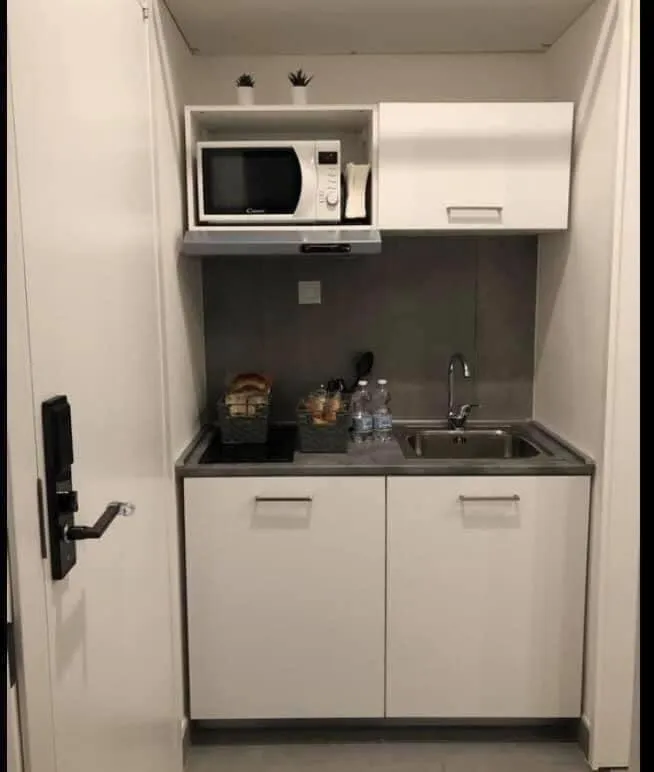 Kitchen or kitchenette in VESUCHARME SUITE Luxury Room