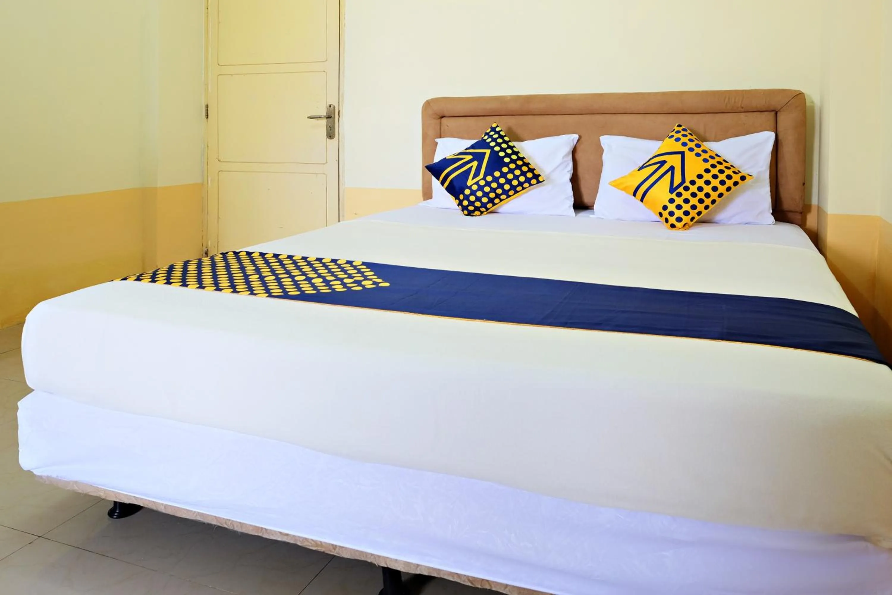 Bedroom in Hotel O Zn Guest House