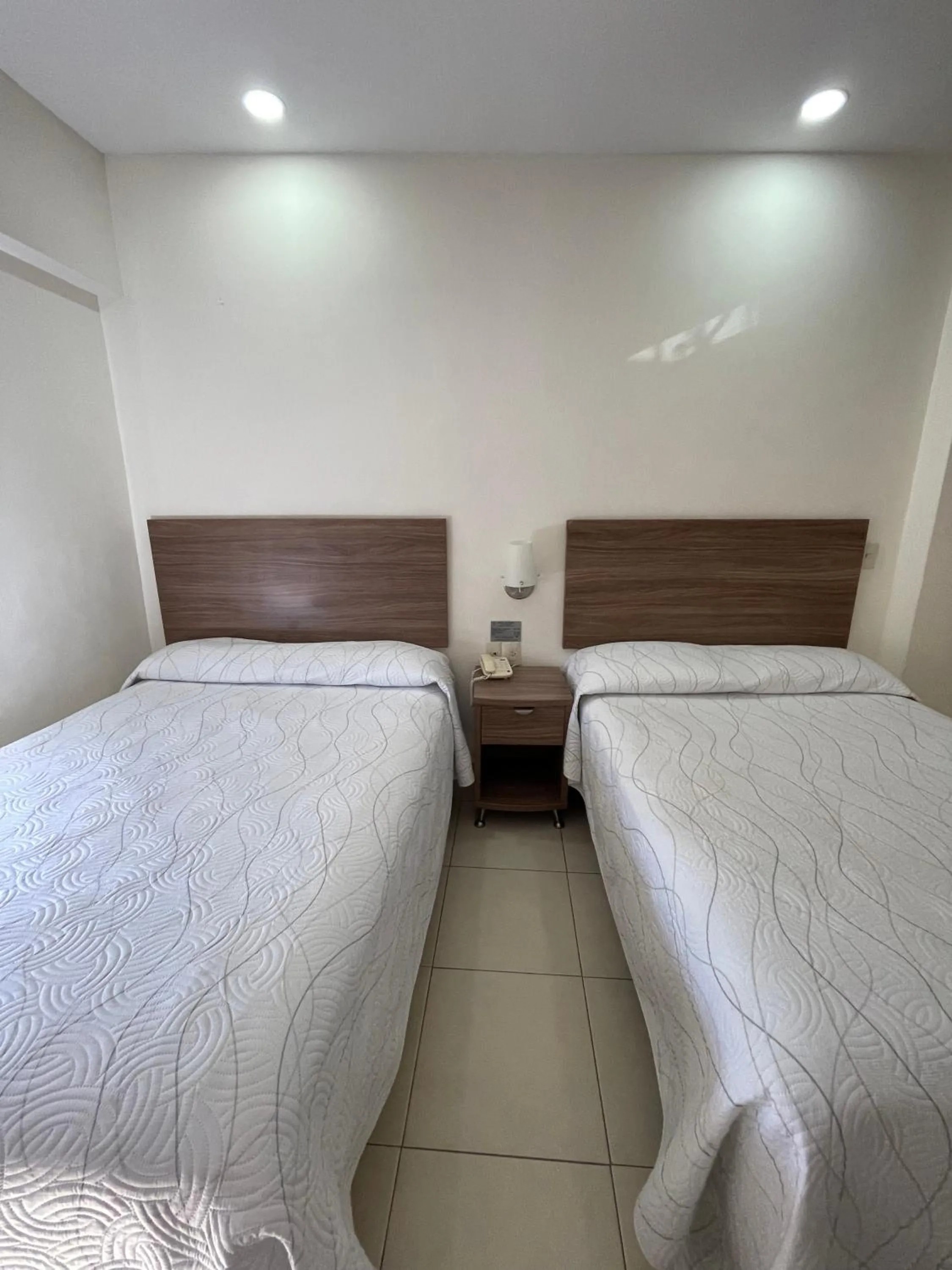Photo of the whole room, Bed in Hotel el Mayo Inn