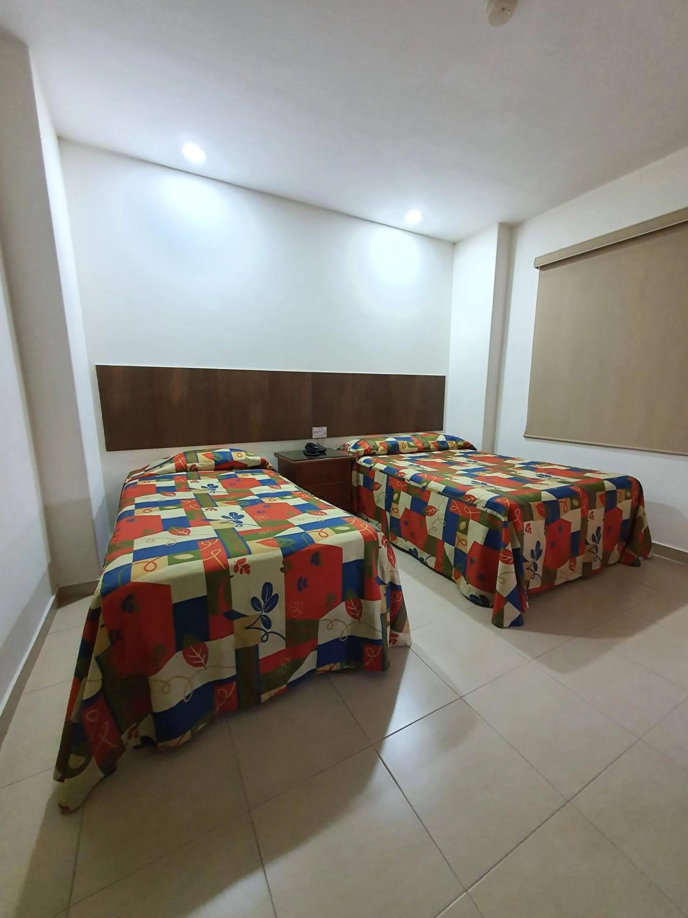 Photo of the whole room, Bed in Hotel el Mayo Inn