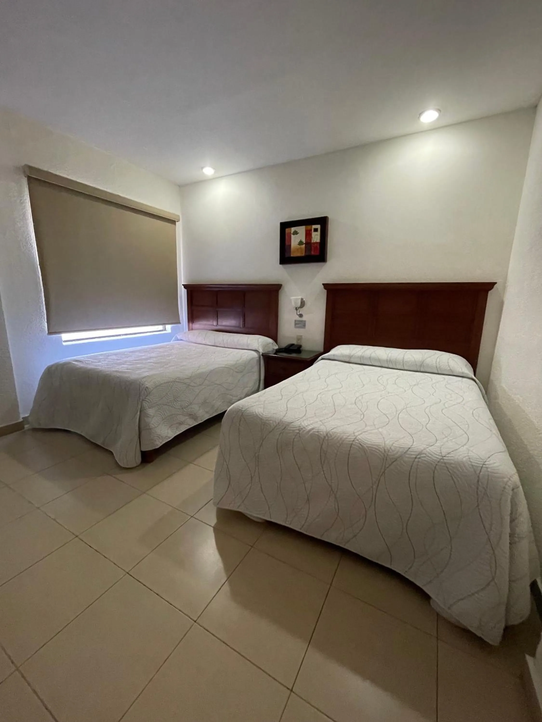 Photo of the whole room, Bed in Hotel el Mayo Inn