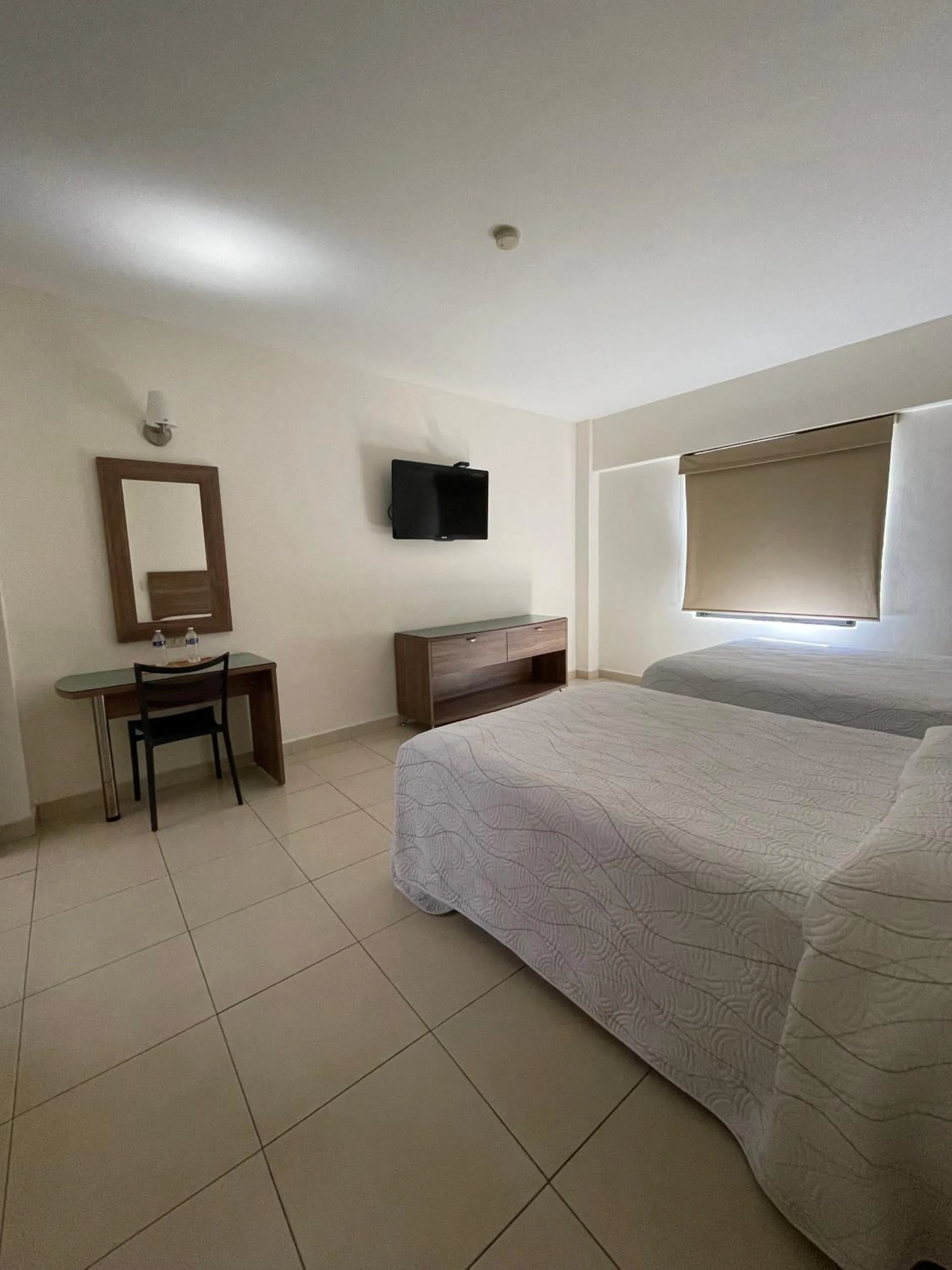 Photo of the whole room, Bed in Hotel el Mayo Inn