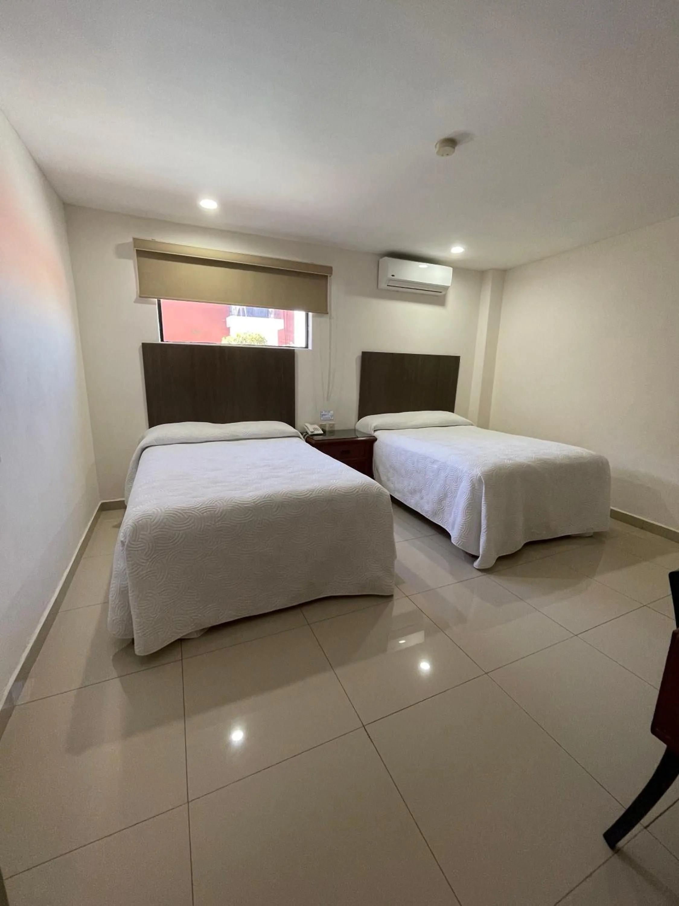Photo of the whole room, Bed in Hotel el Mayo Inn