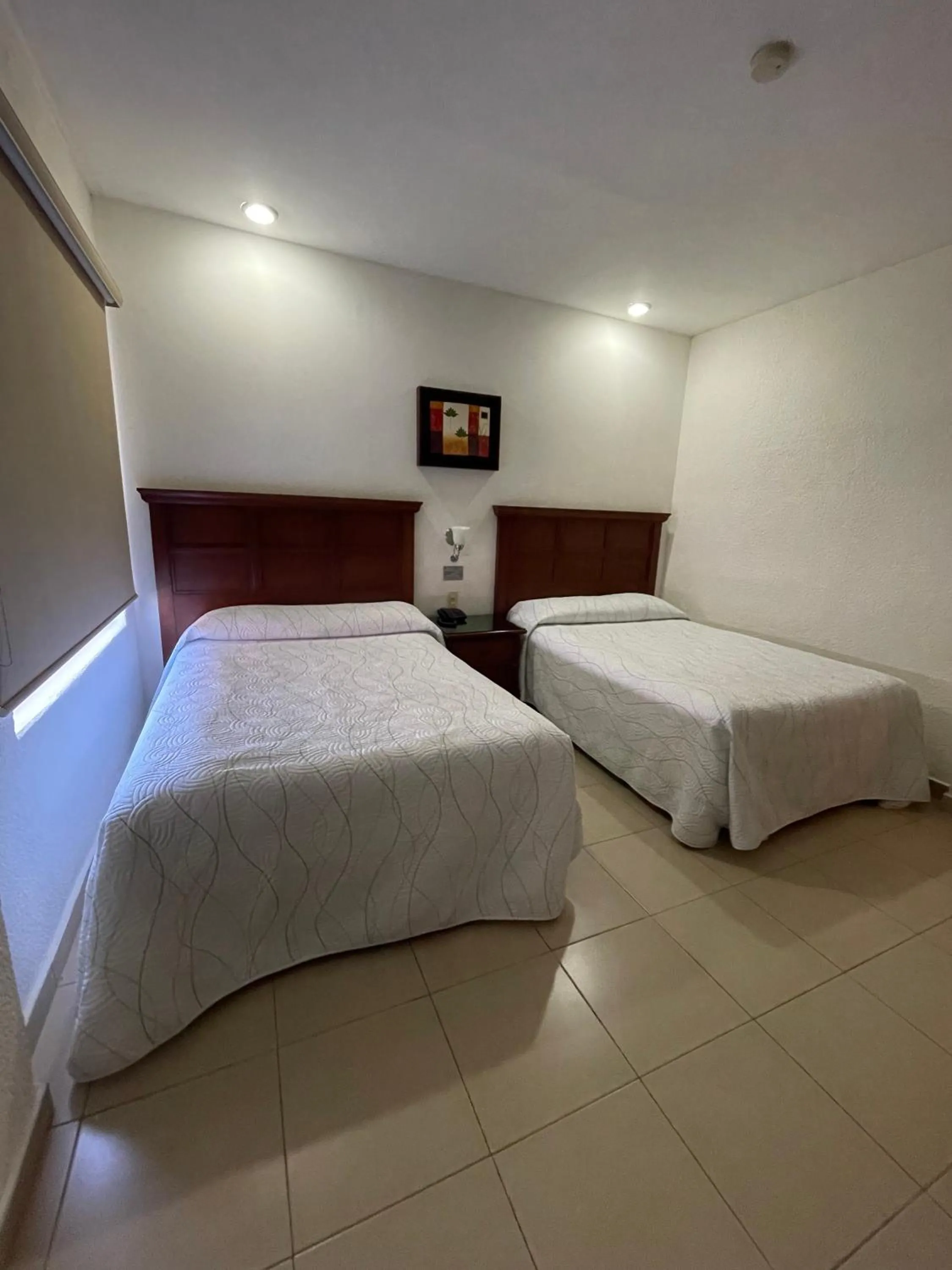 Photo of the whole room, Bed in Hotel el Mayo Inn