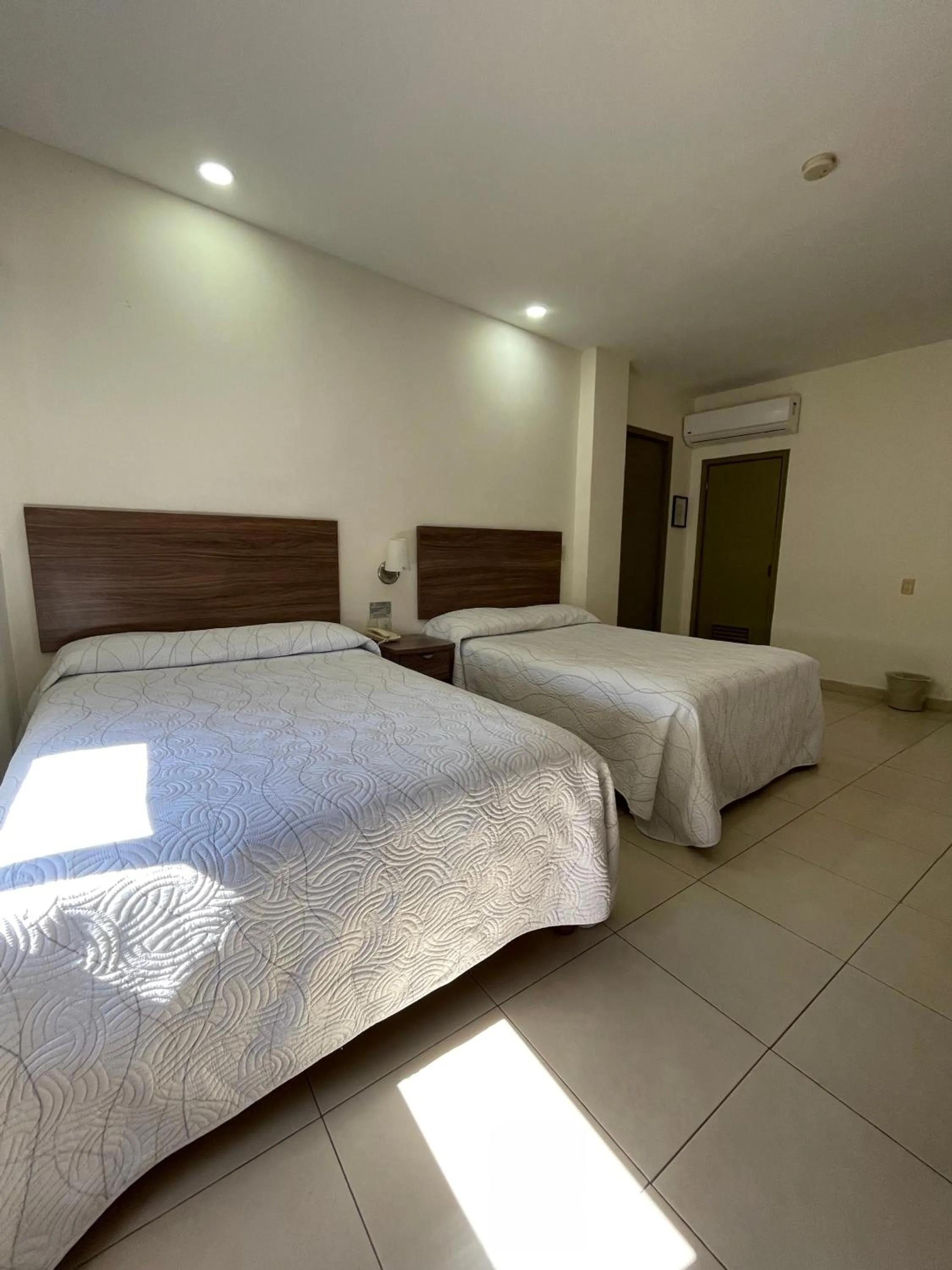 Photo of the whole room, Bed in Hotel el Mayo Inn