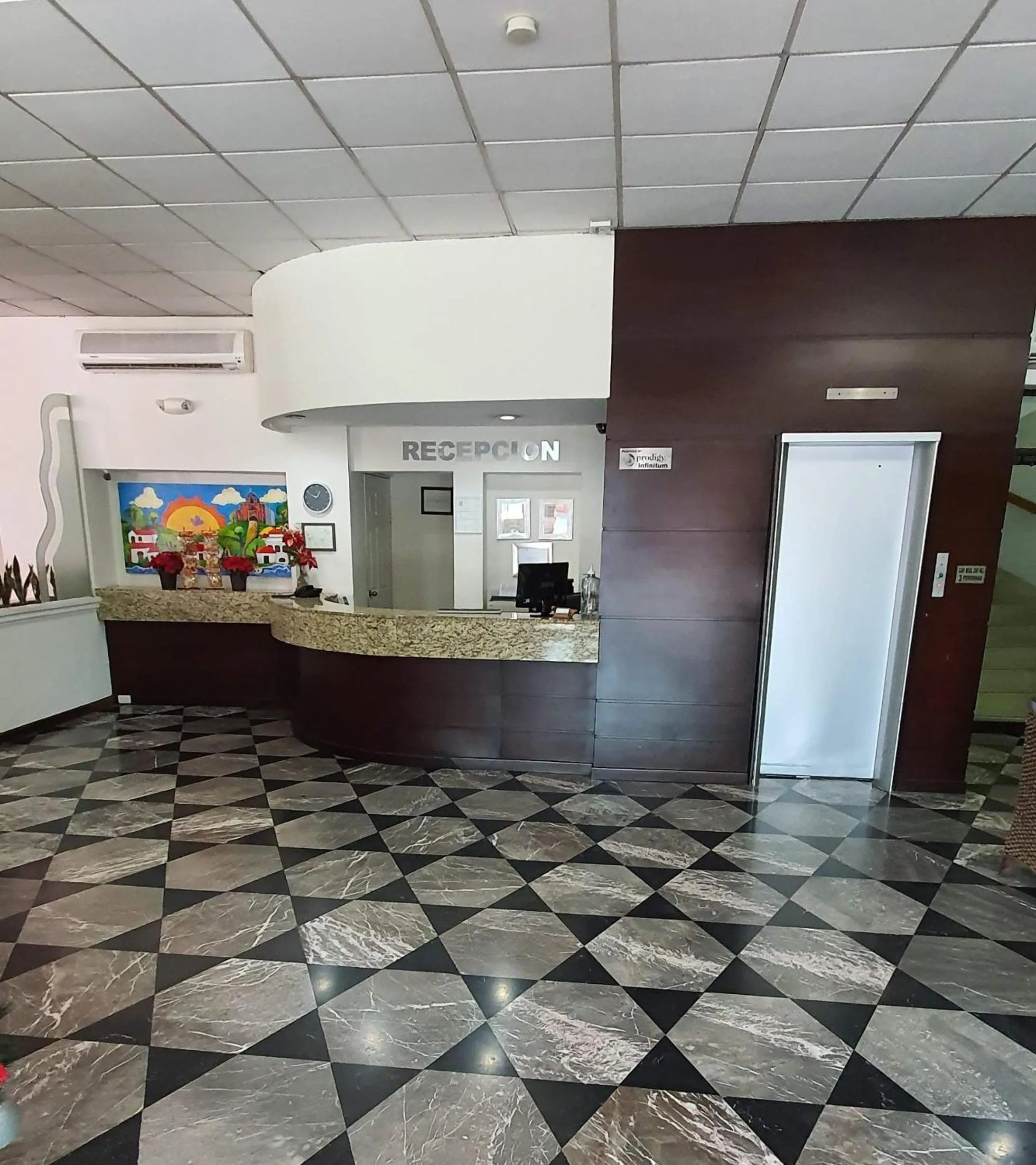 Lobby or reception in Hotel el Mayo Inn