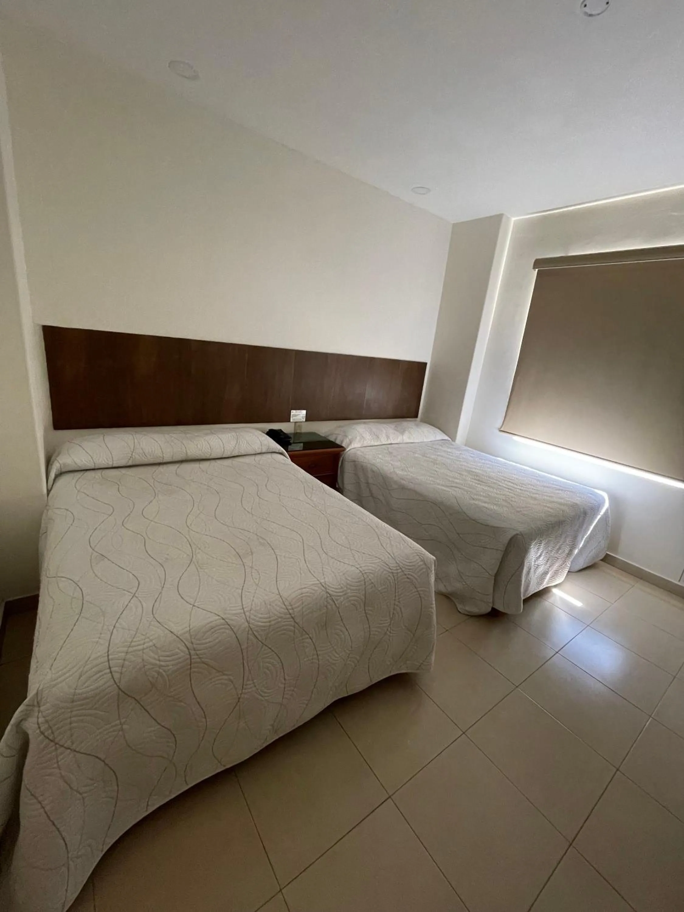 Photo of the whole room, Bed in Hotel el Mayo Inn