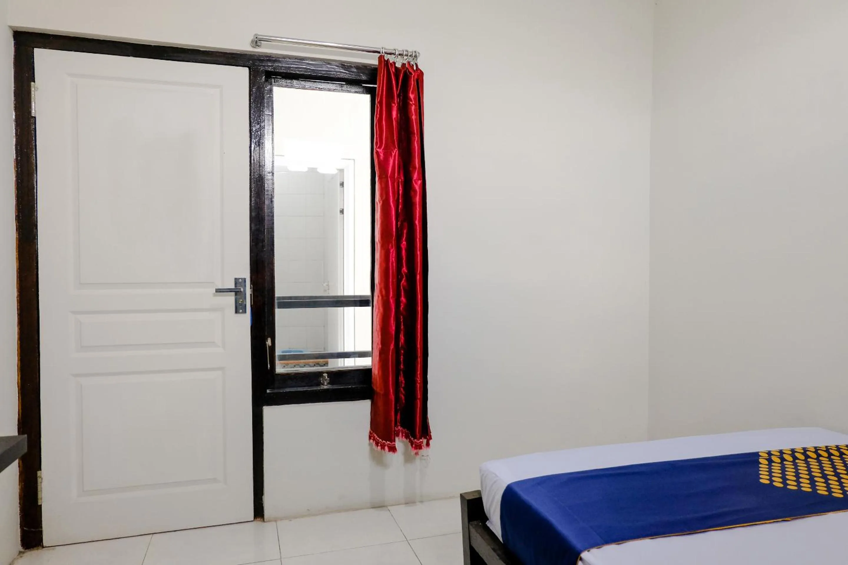 Bedroom in SPOT ON 2723 Gatsu Kost