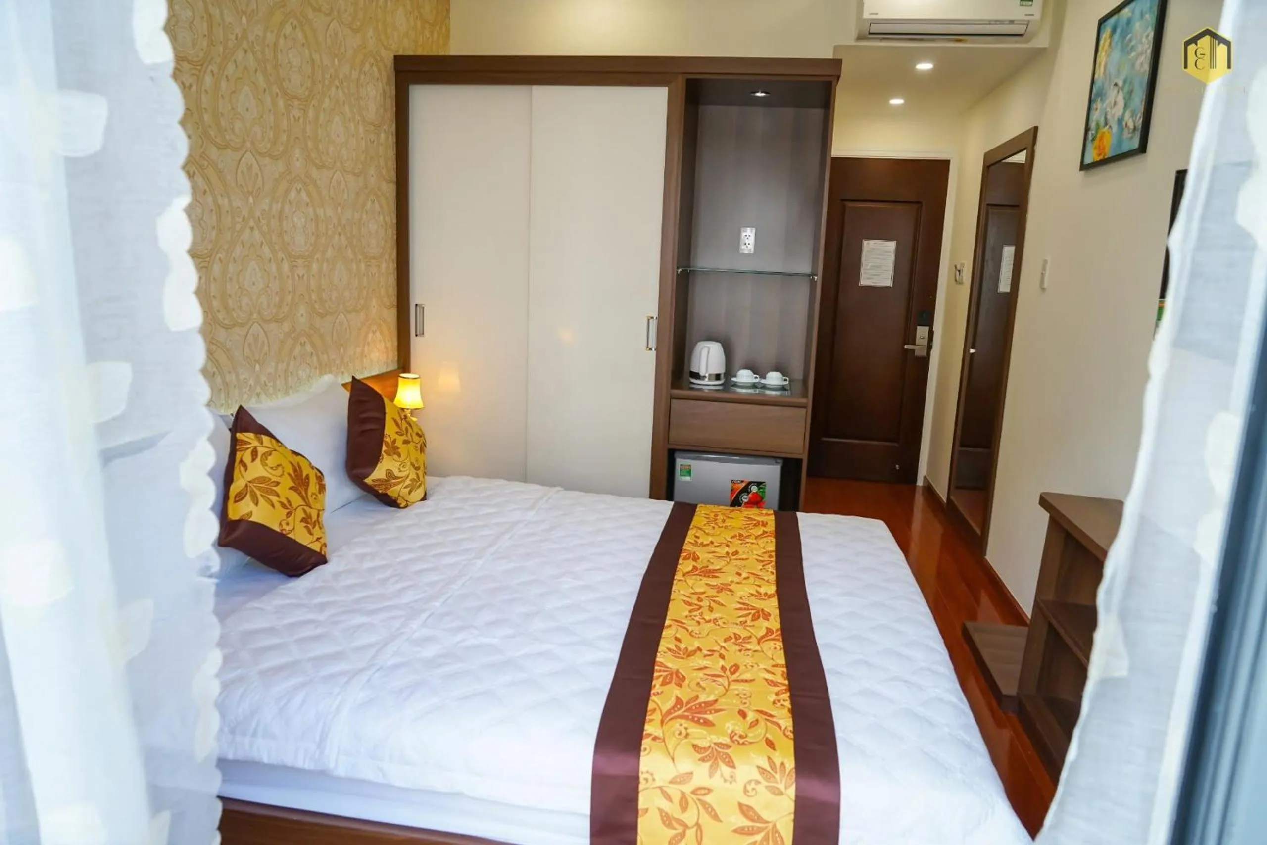 Bed in GOLD CITY Hotel
