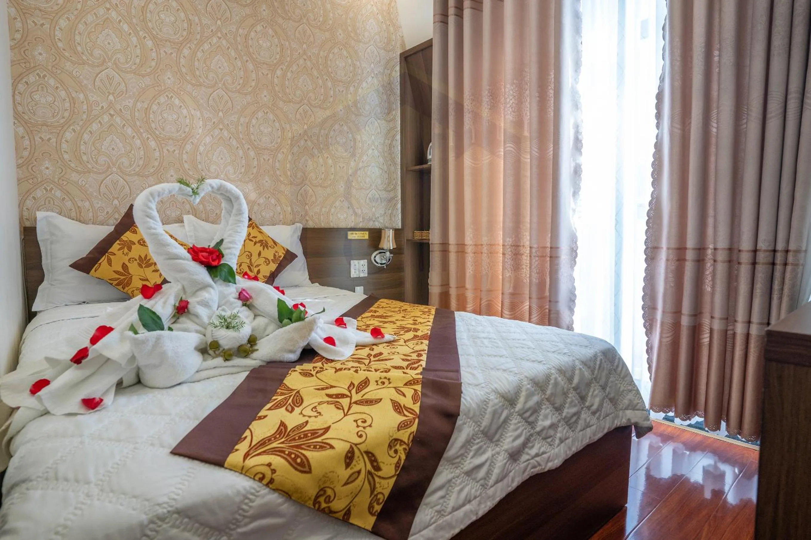 Bed in GOLD CITY Hotel