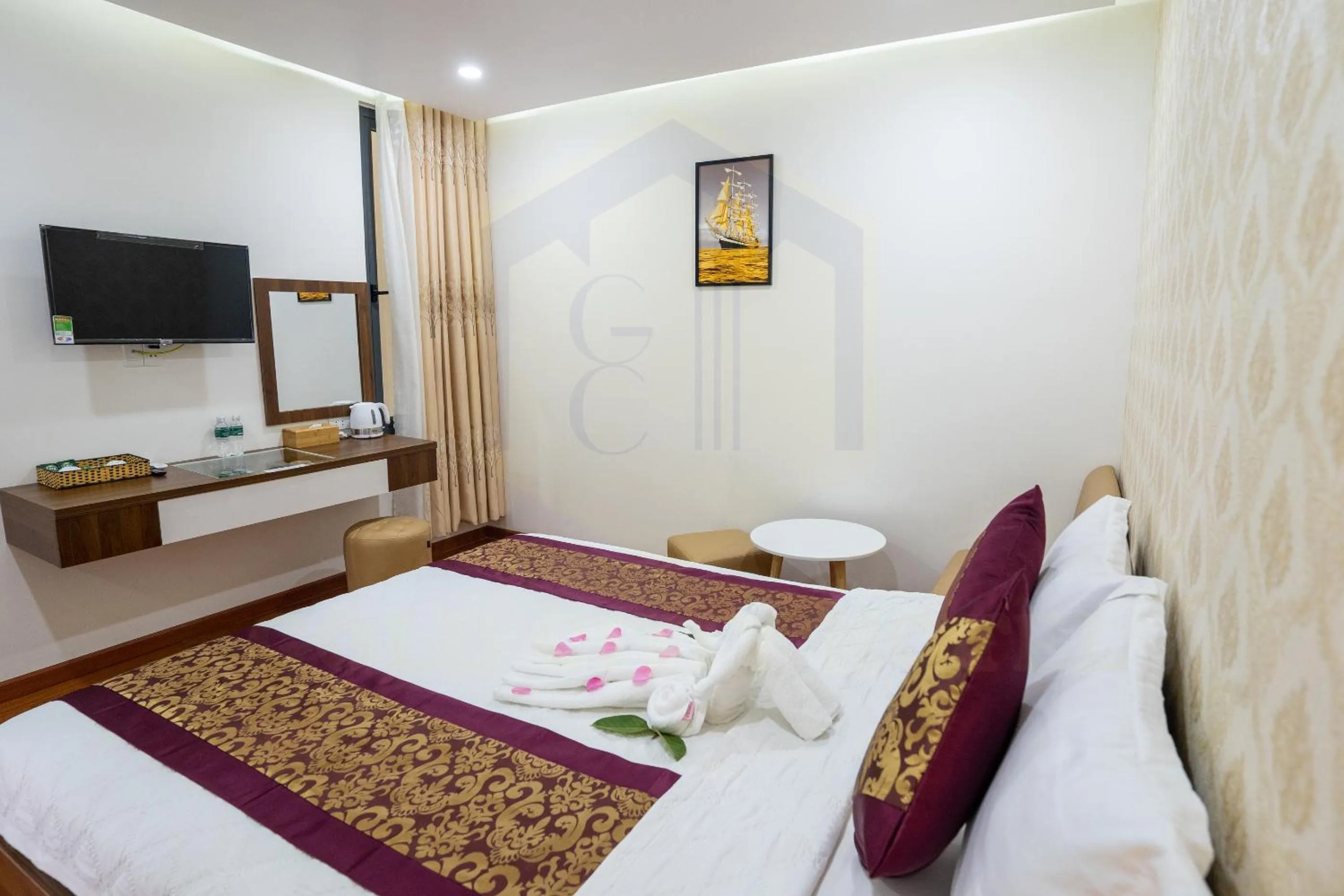 Bed in GOLD CITY Hotel
