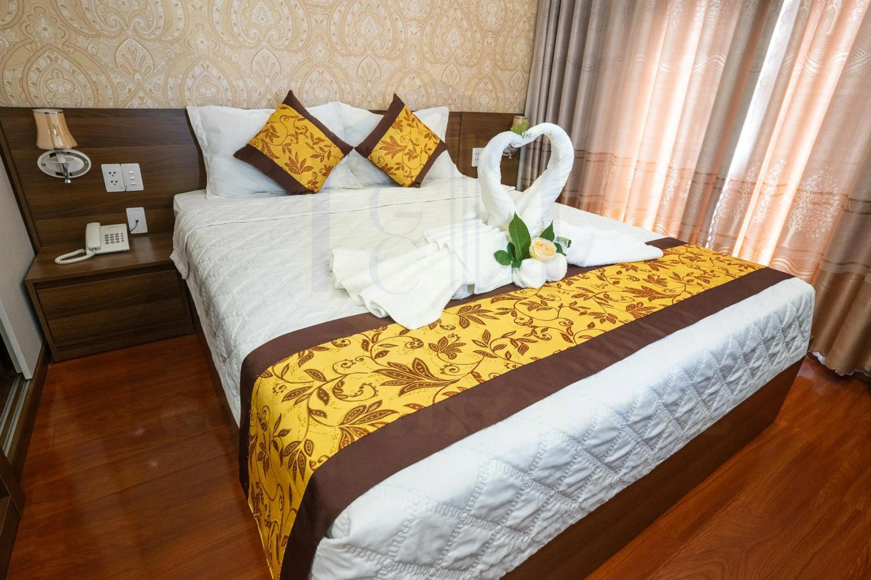 Bed in GOLD CITY Hotel