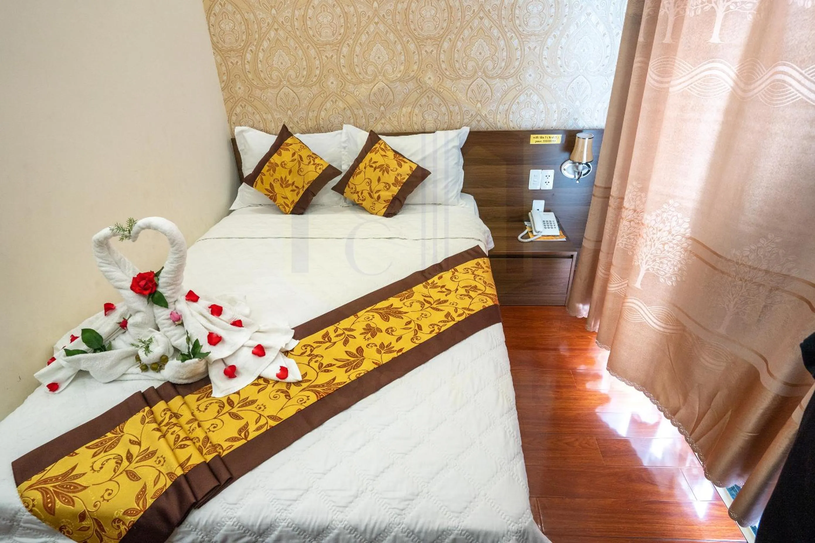 Bed in GOLD CITY Hotel