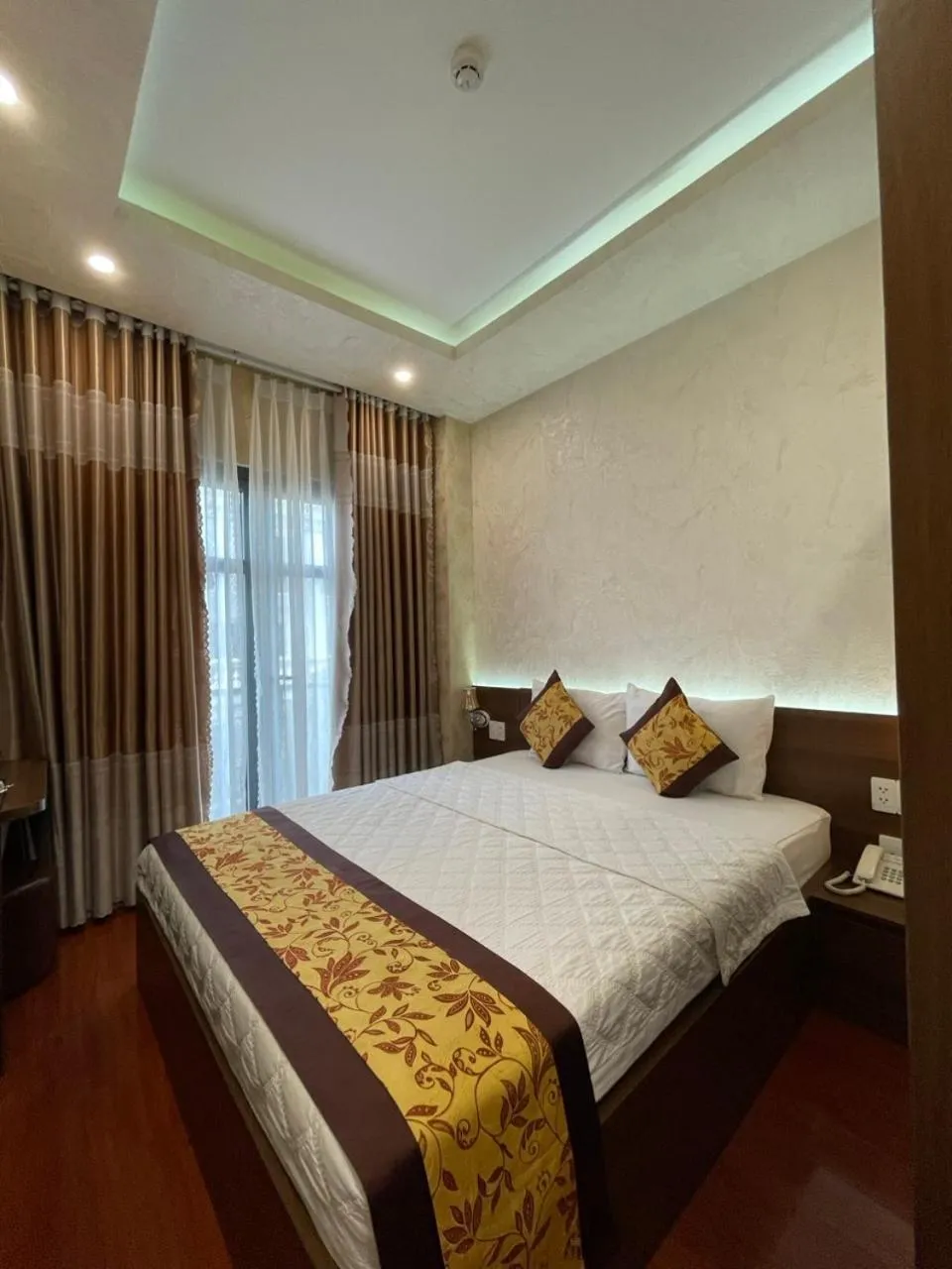 Bed in GOLD CITY Hotel