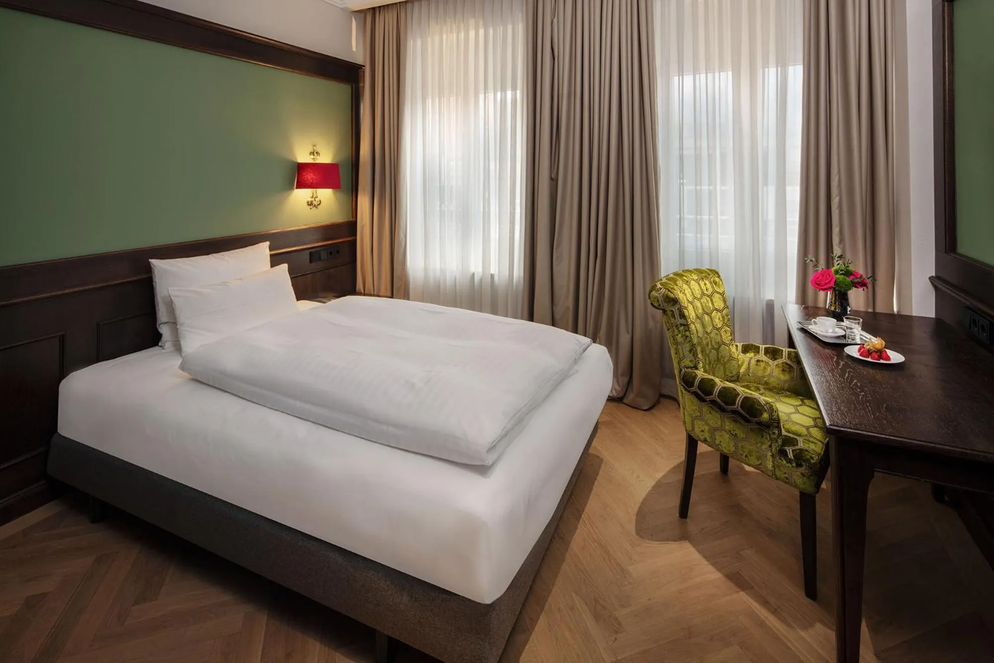 Bed in Eden Hotel Wolff