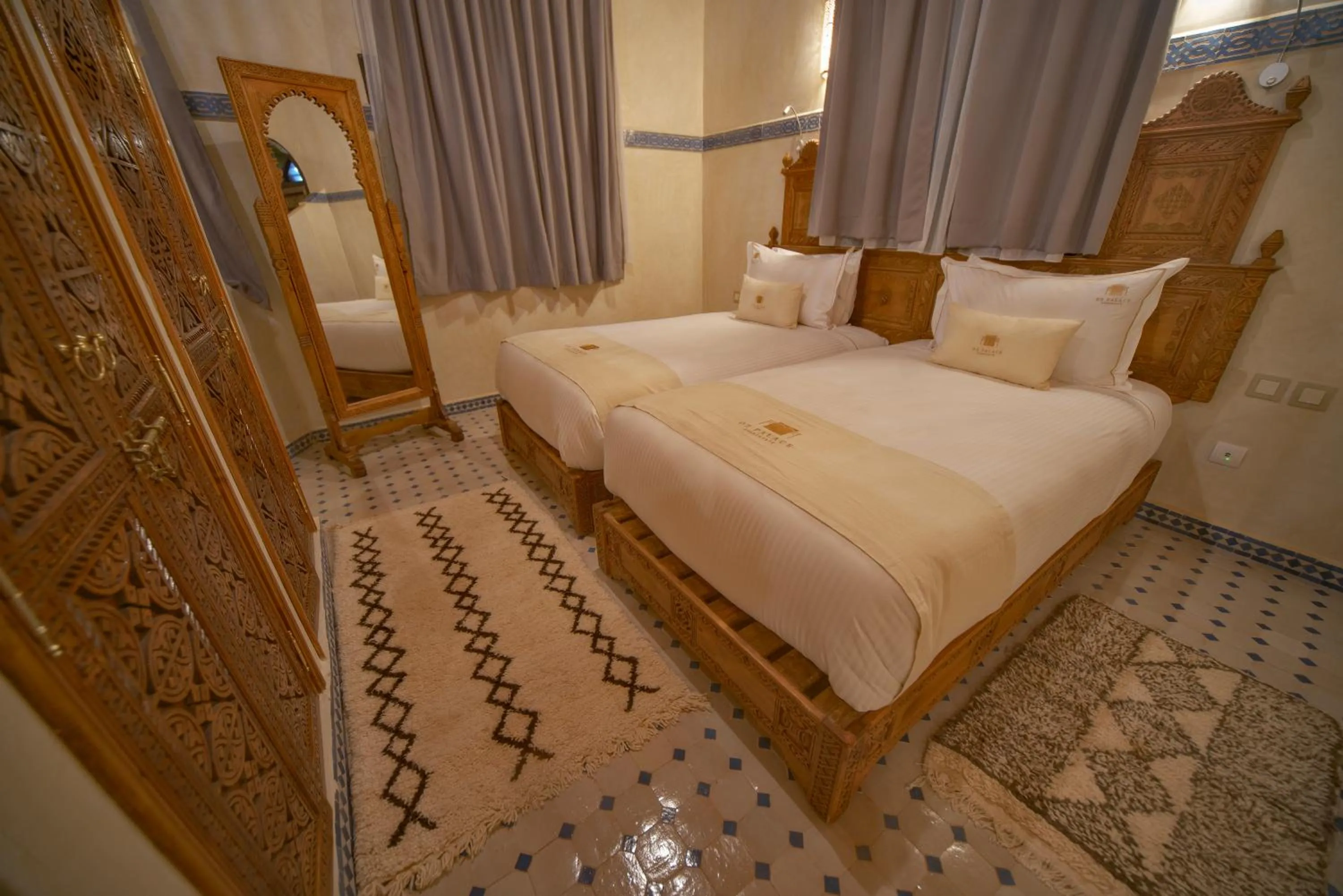 Bed in OZ Palace Ouarzazate & SPA