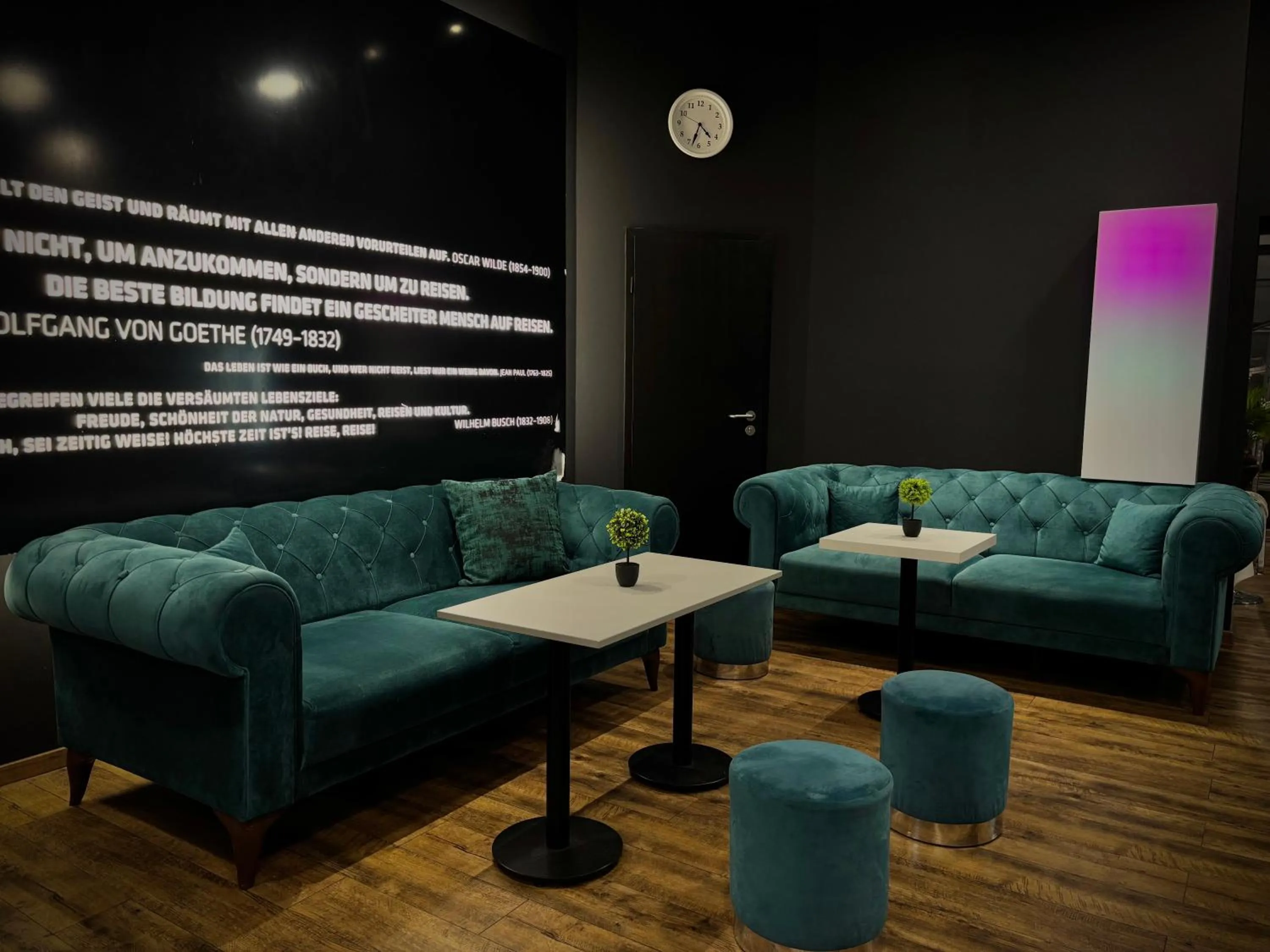 Communal lounge/ TV room in Colour Hotel