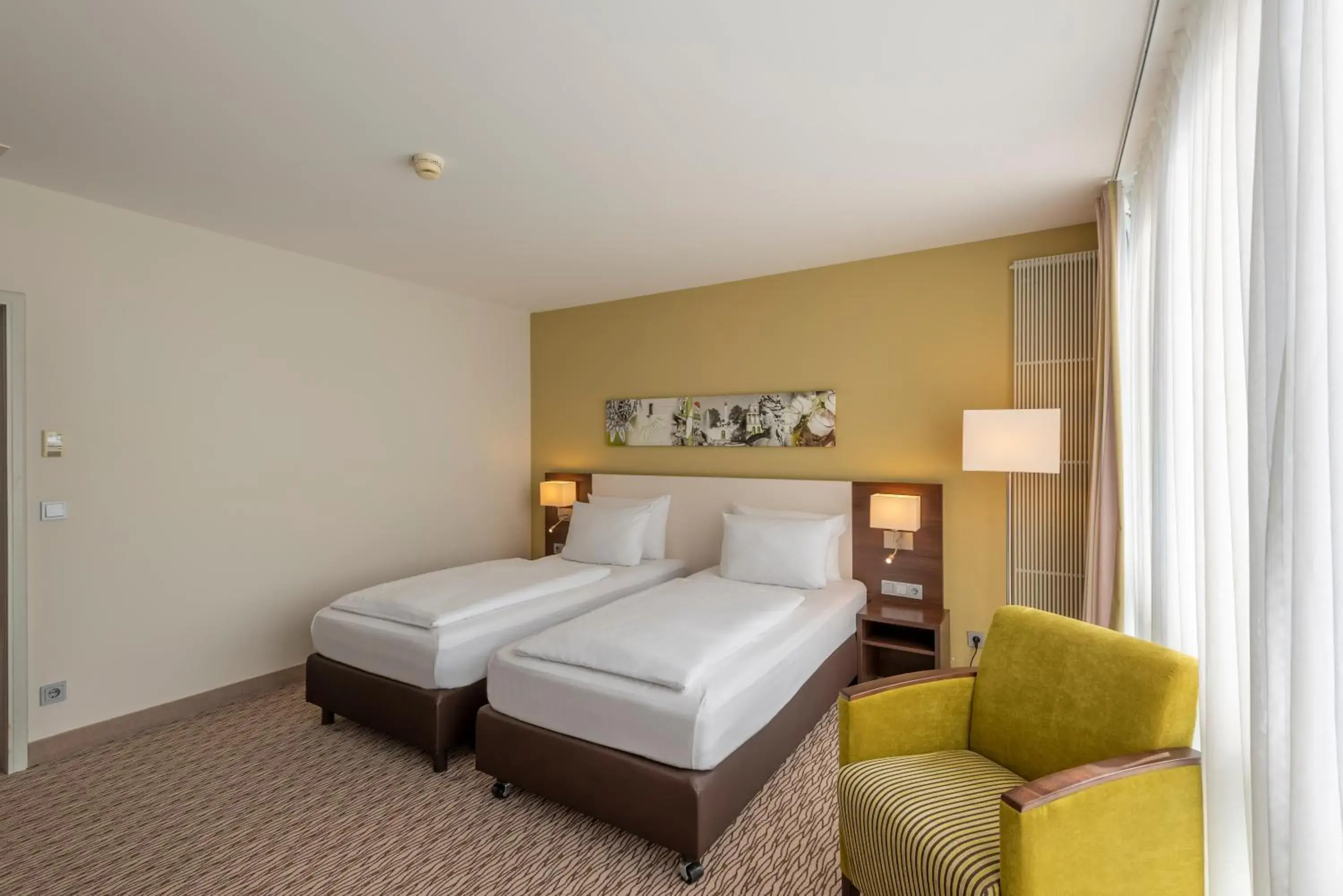 Photo of the whole room, Bed in Holiday Inn Munich Unterhaching by IHG Photo of the whole room, Bed in Holiday Inn Munich Unterhaching by IHG