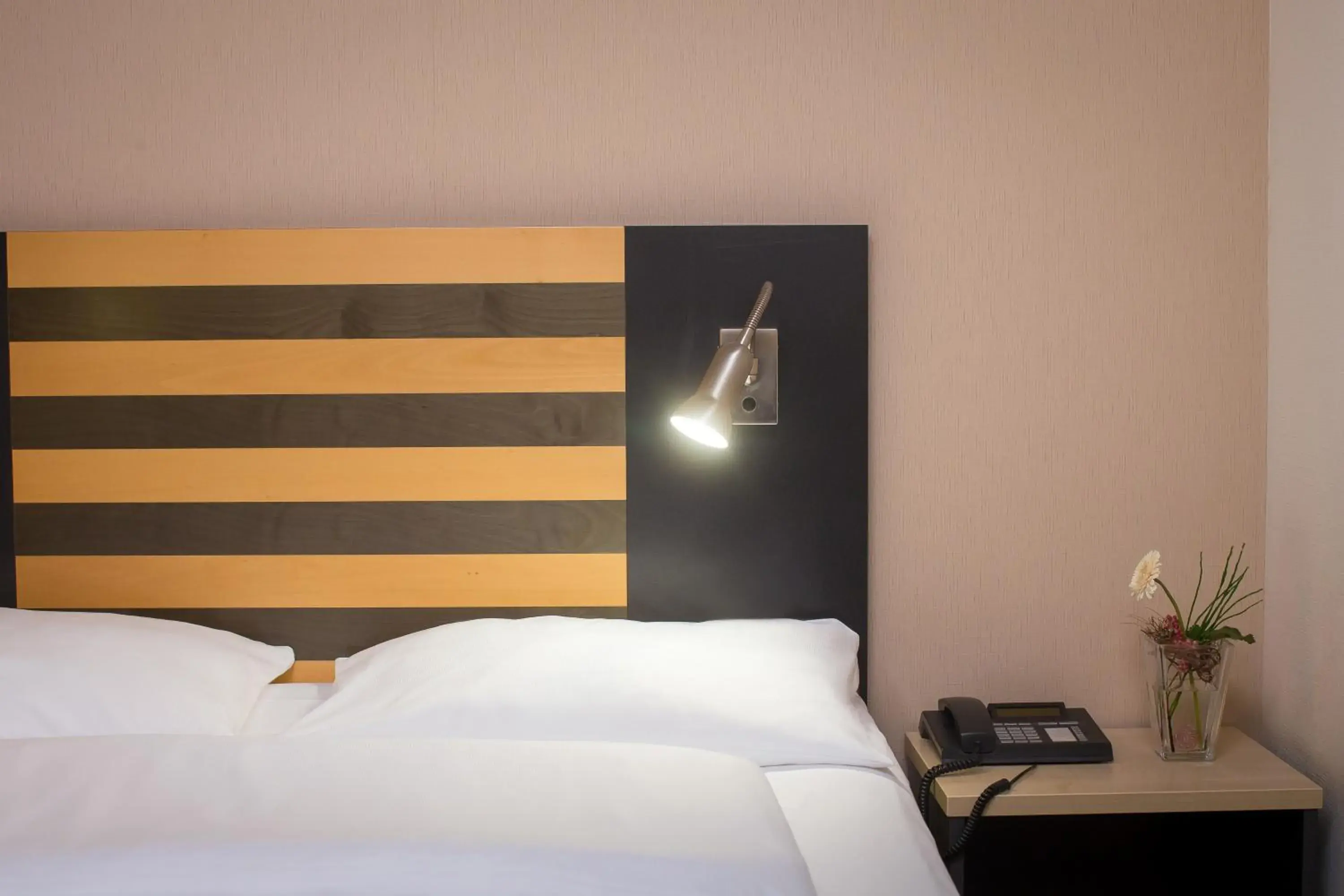 Bedroom, Bed in Lindner Hotel Frankfurt Hochst, part of JdV by Hyatt Bedroom, Bed in Lindner Hotel Frankfurt Hochst, part of JdV by Hyatt