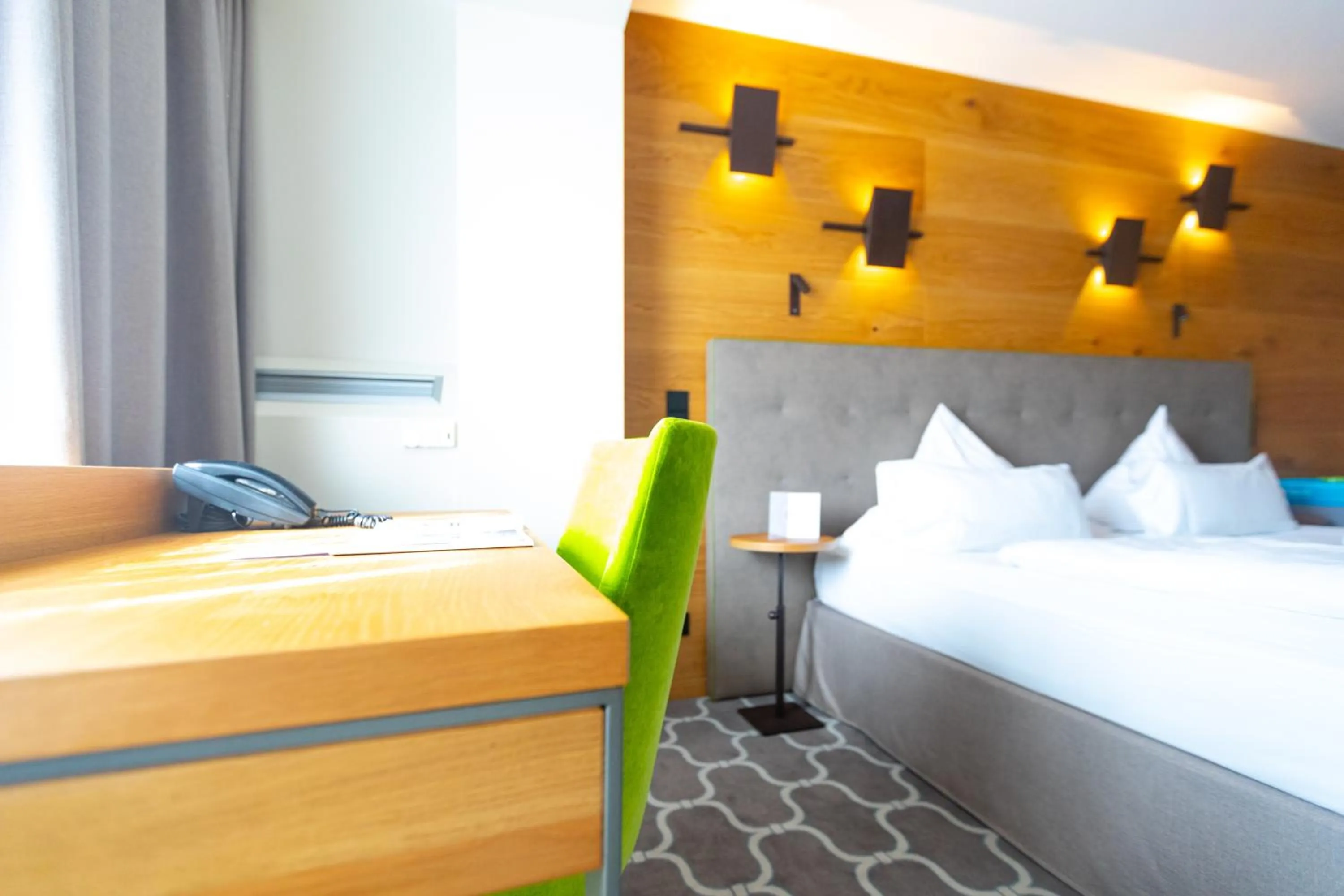 Seating area, Bed in Olymp Munich