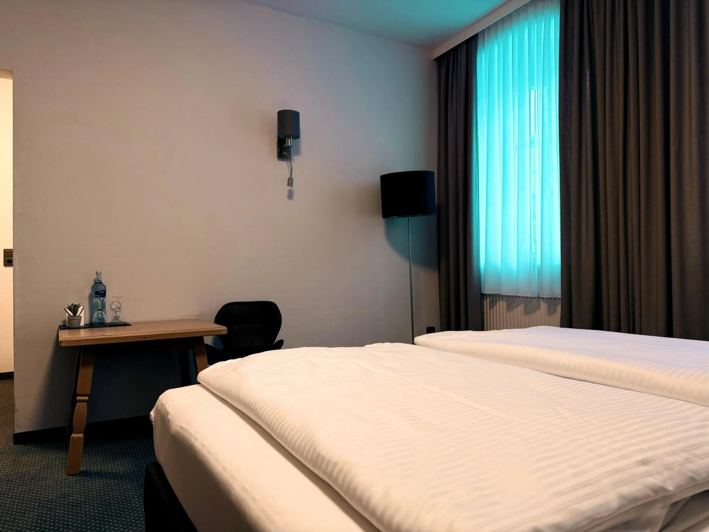 Bed in Gasthof Hotel Bräustübl und Haus Boutique