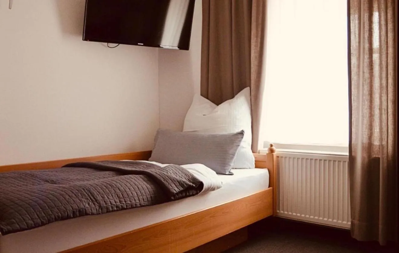 Bed in Gasthof Hotel Bräustübl und Haus Boutique