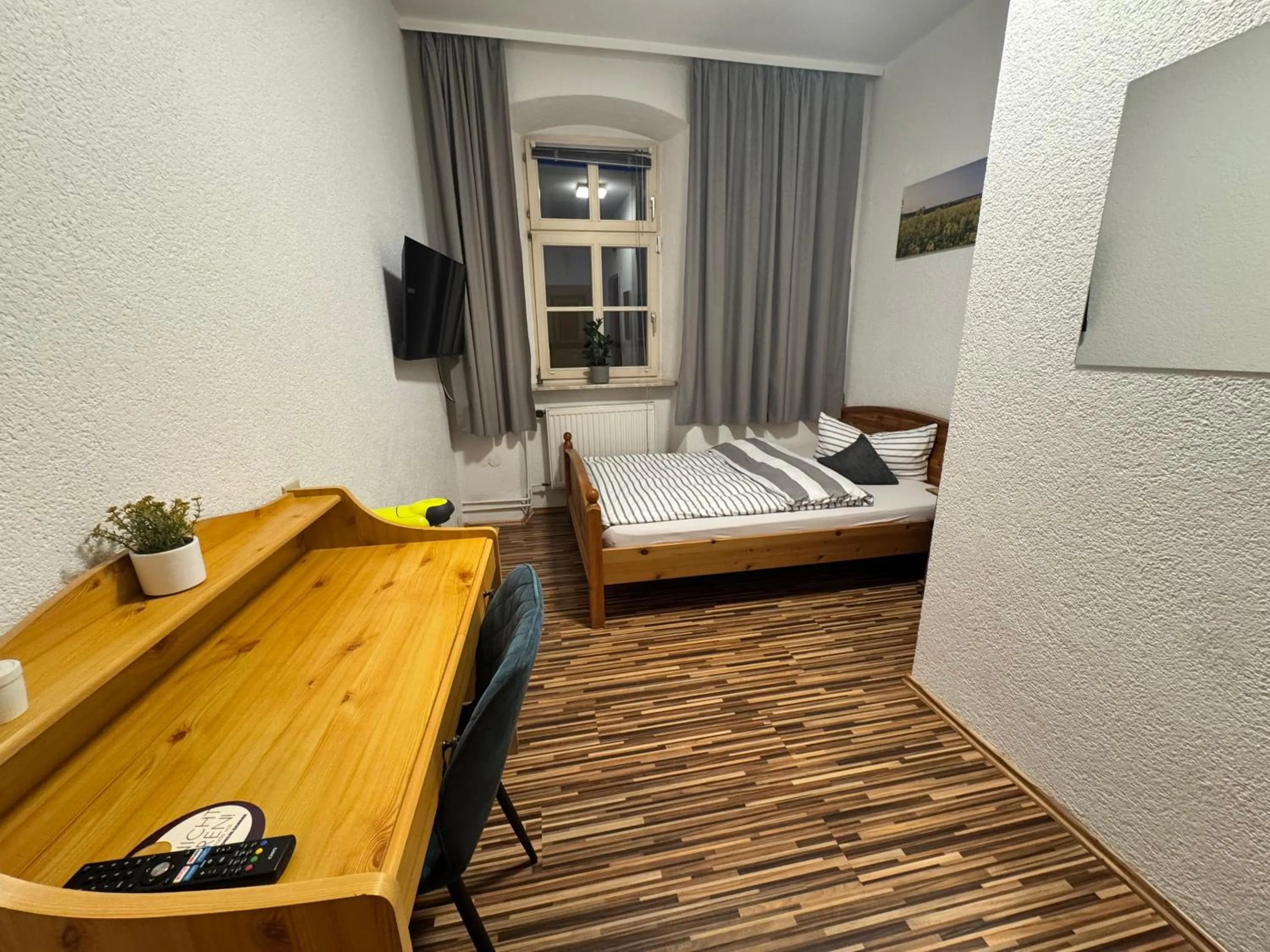 Photo of the whole room, Bed in Gasthof Hotel Bräustübl